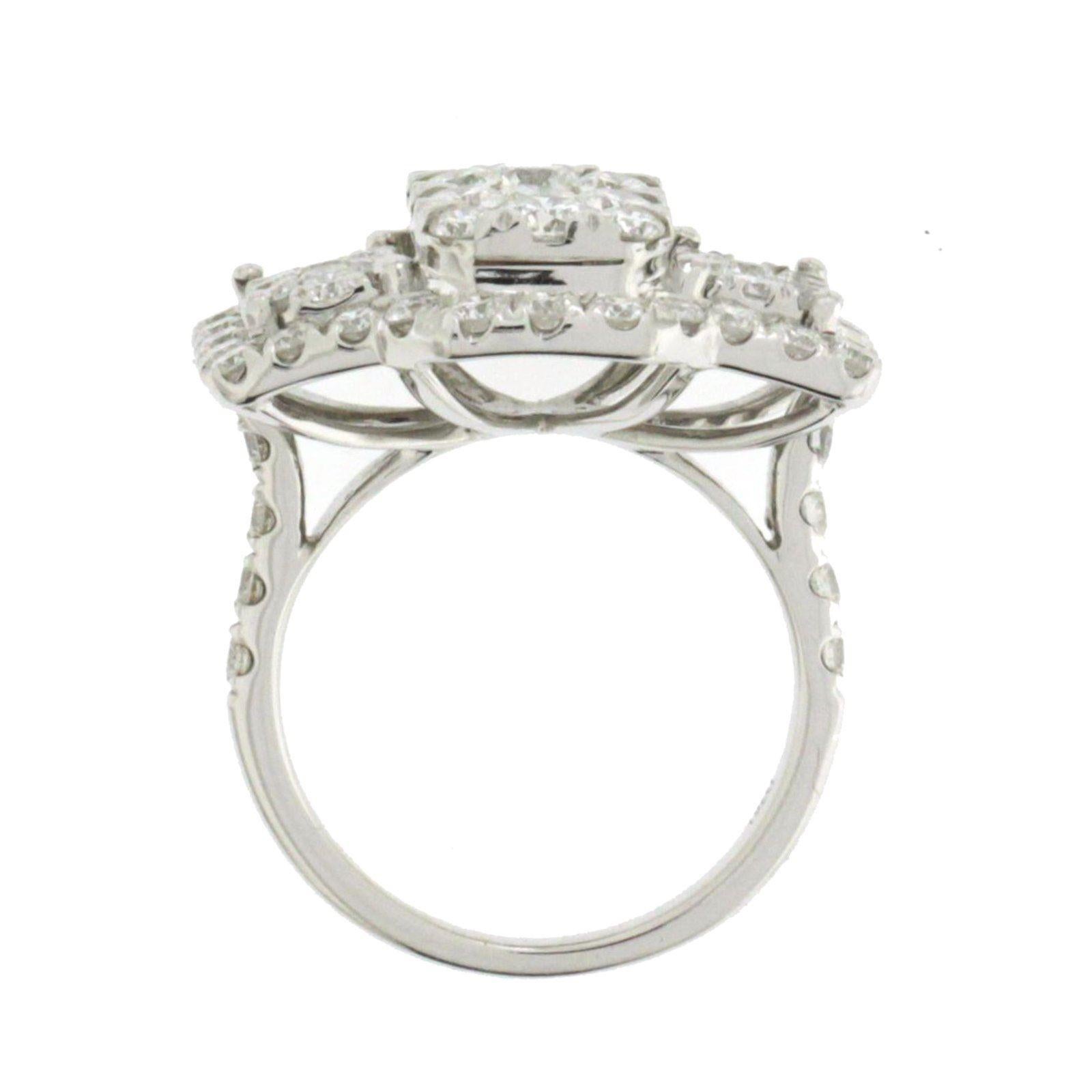 Top: 15 mm
Band Width: 2 mm
Metal: 18K White Gold 
Size: 5 to 7
Hallmarks: 750
Total Weight: 7 Grams
Stone Type: 2.86 CT G VS1-2 CT Diamonds
Condition: New
Estimated Retail Price: $12000
Stock Number: 20-02380