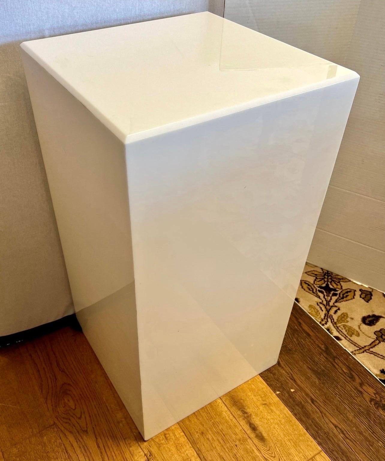Display your favorite collectible, sculpture or the like on this white acrylic pedestal column that is illuminated from within. The lone interior bulb is a standard 60 watt bulb. Great lines and better scale.