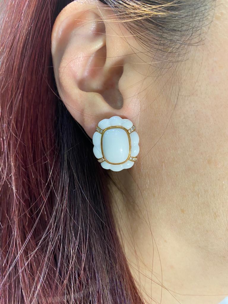 This earrings feature 18.55 carats of white agate, each agate is handcrafted by our craftsman. The white agate is set in 14 karat rose gold, assented with 0.23 carat of white round diamonds.

Dimensions: 0.85 inch x 0.72 inch
White Agate 18.55