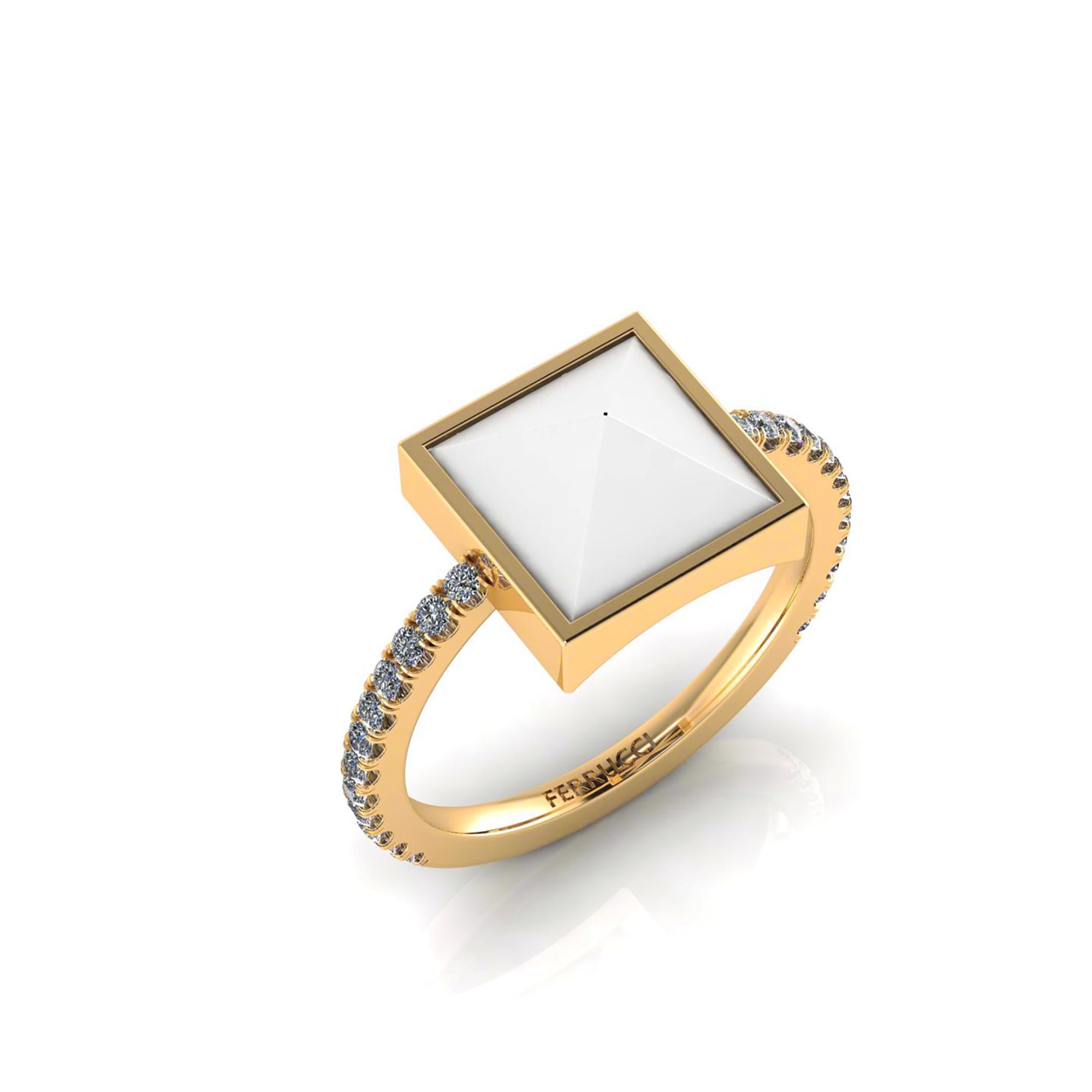 Pyramids collection the white agate solitaire ring in 18k Yellow gold, with White brilliant cut diamonds for an approximate total weight of 0.30 carats, made in New York.

White Agate is credited with harmonizing an individual's feminine and