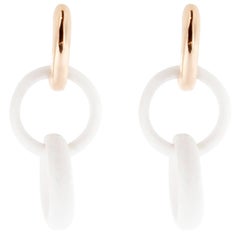 Boucles d'oreilles pendantes en or rose et agate blanche