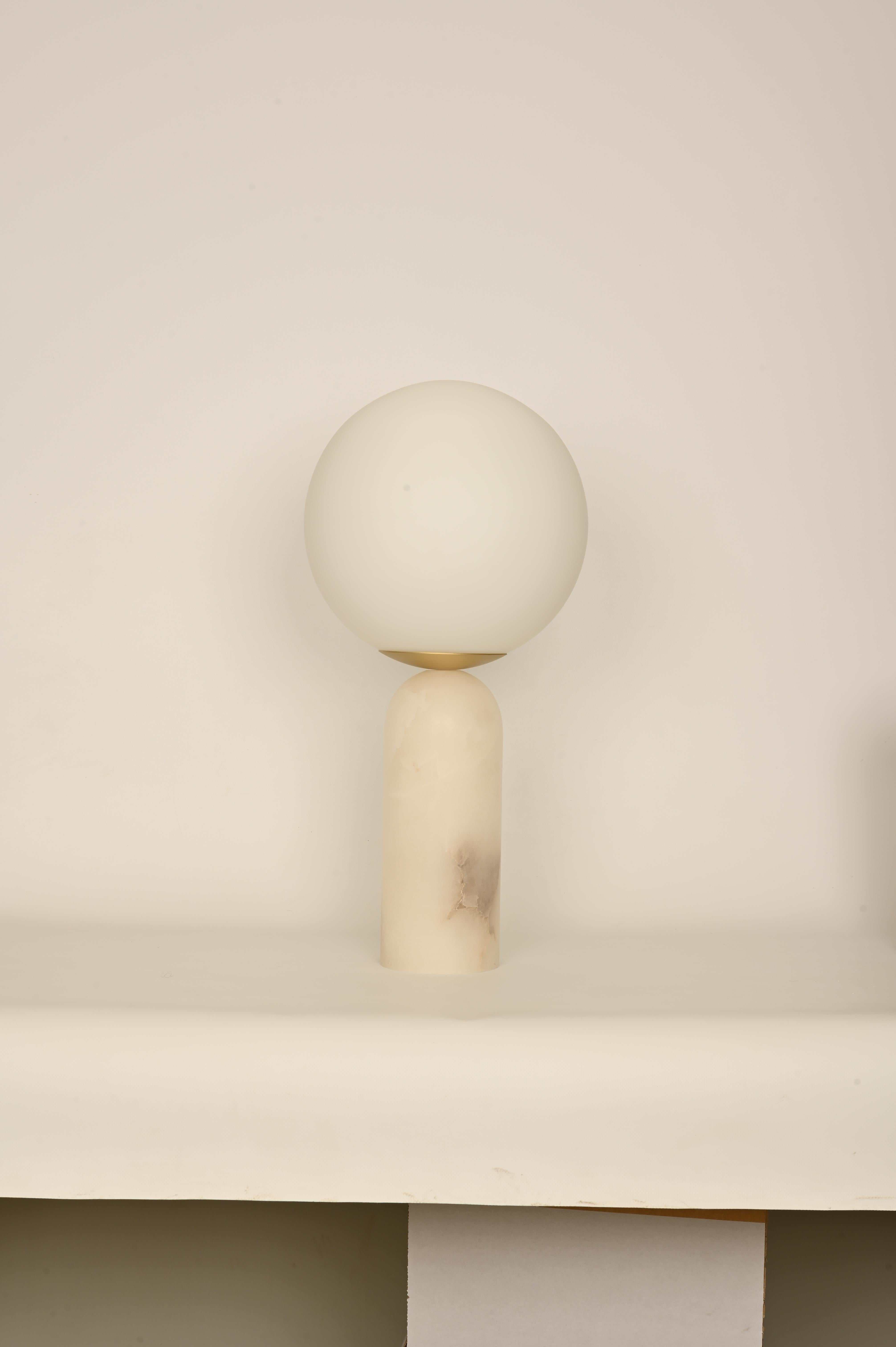 White Alabaster and Brass Atlas Table Lamp by Simone & Marcel
Dimensions: Ø 30 x H 60 cm.
Materials: Glass, brass and white alabaster.

Also available in different marble, wood and alabaster options and finishes. Custom options available on request.