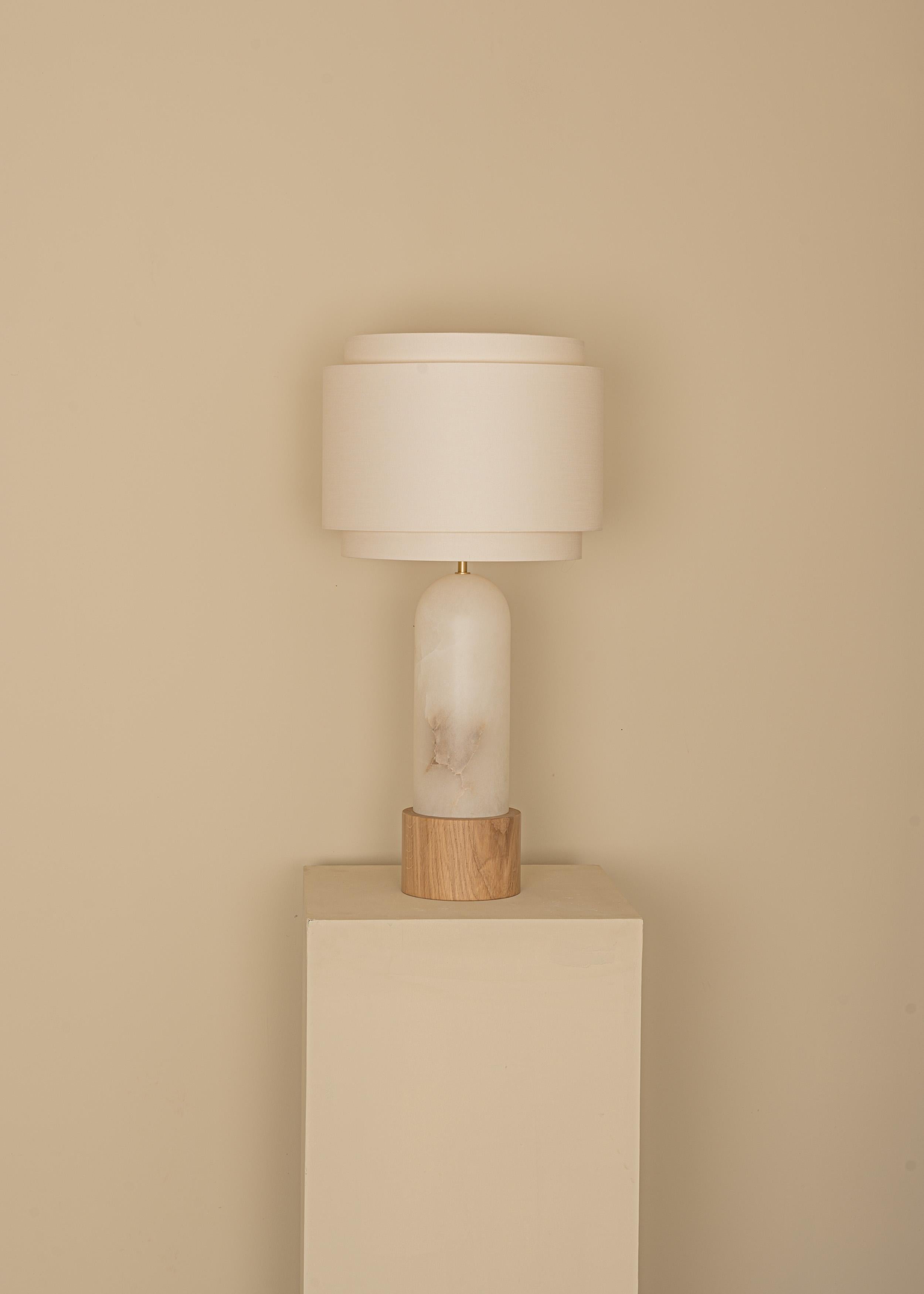 White Alabaster And Oak Base Pura Kelo Double Table Lamp by Simone & Marcel
Dimensions: D 35 x W 35 x H 69 cm.
Materials: Brass, cotton, oak and white alabaster.

Also available in different marble, wood and alabaster options and finishes. Custom