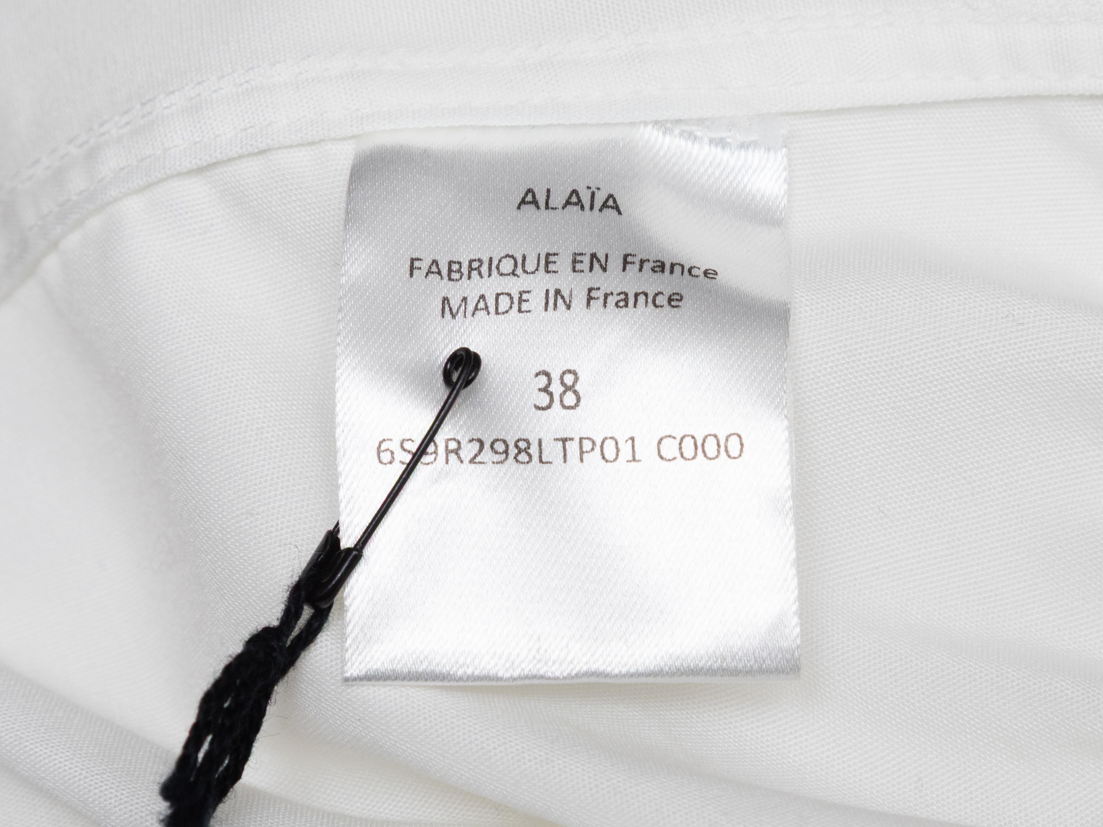 Weißes Alaia Ärmelloses Kleid mit Rüschenbesatz Größe FR 38 im Angebot 1