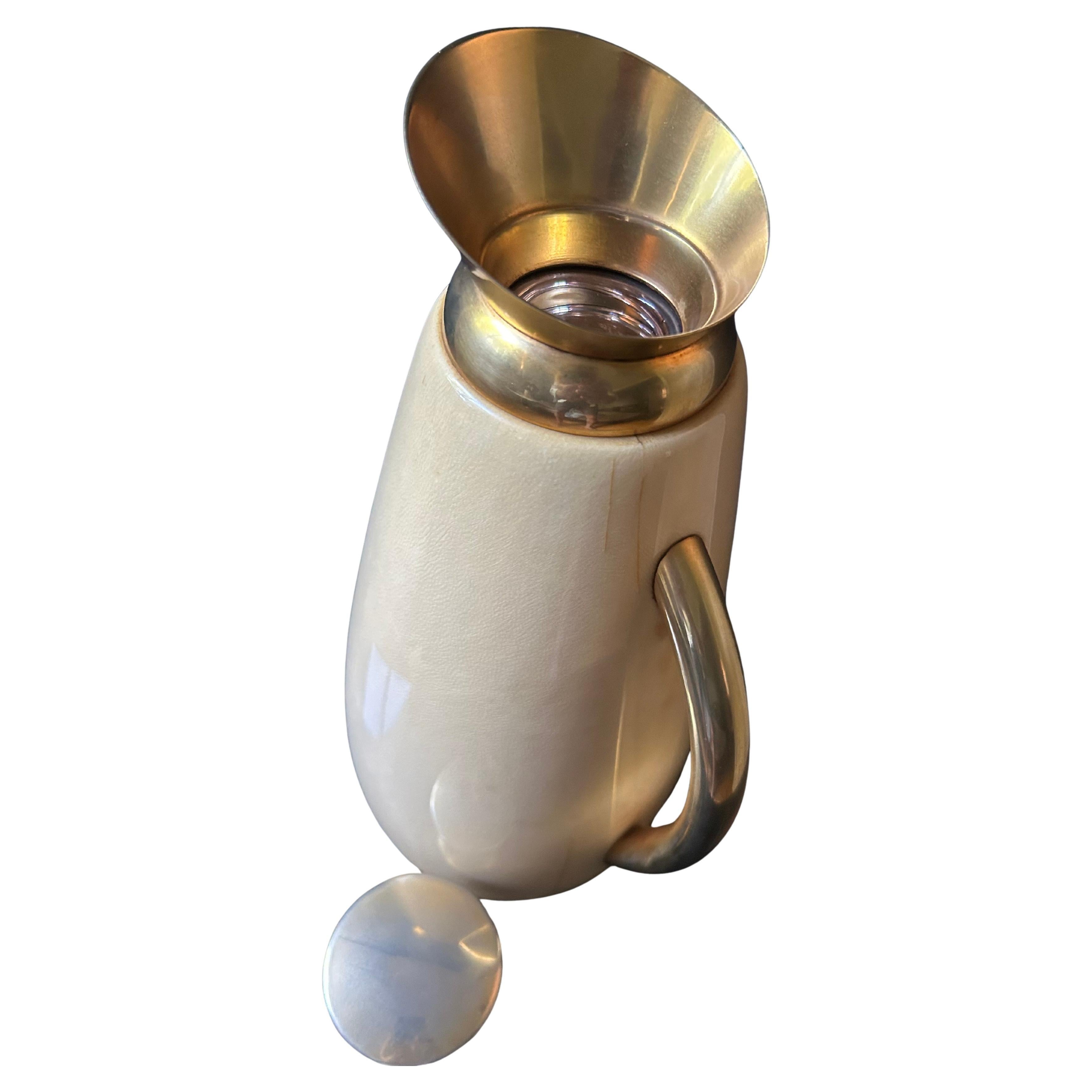 See our store for more Aldo Tura barware, bar carts and accessories (including a matching ice bucket and mixing set!)

Elegantly shaped and generous in size this thermos pitcher hails from the legendary workshops of Aldo Tura in Milan, Italy,