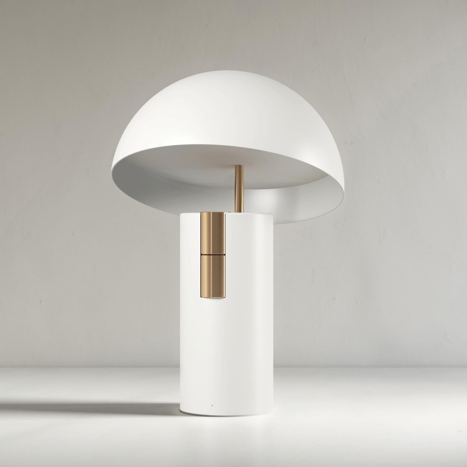 White Alto Speaker Lamp by JAUNE STUDIO
Dimensions: D 25 x H 36 cm
Materials: Aluminum body, lacquered painting, brushed gold or nickel tinted cylinders and stem. Diffuser in opaline white PMMA.

Lighting : Variable LED lighting 1800 to 2700K - 0 to