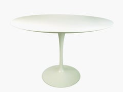 White aluminum, wood Tulip round table by E. Saarinen for Knoll International