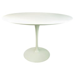 White aluminum, wood Tulip round table by E. Saarinen for Knoll International