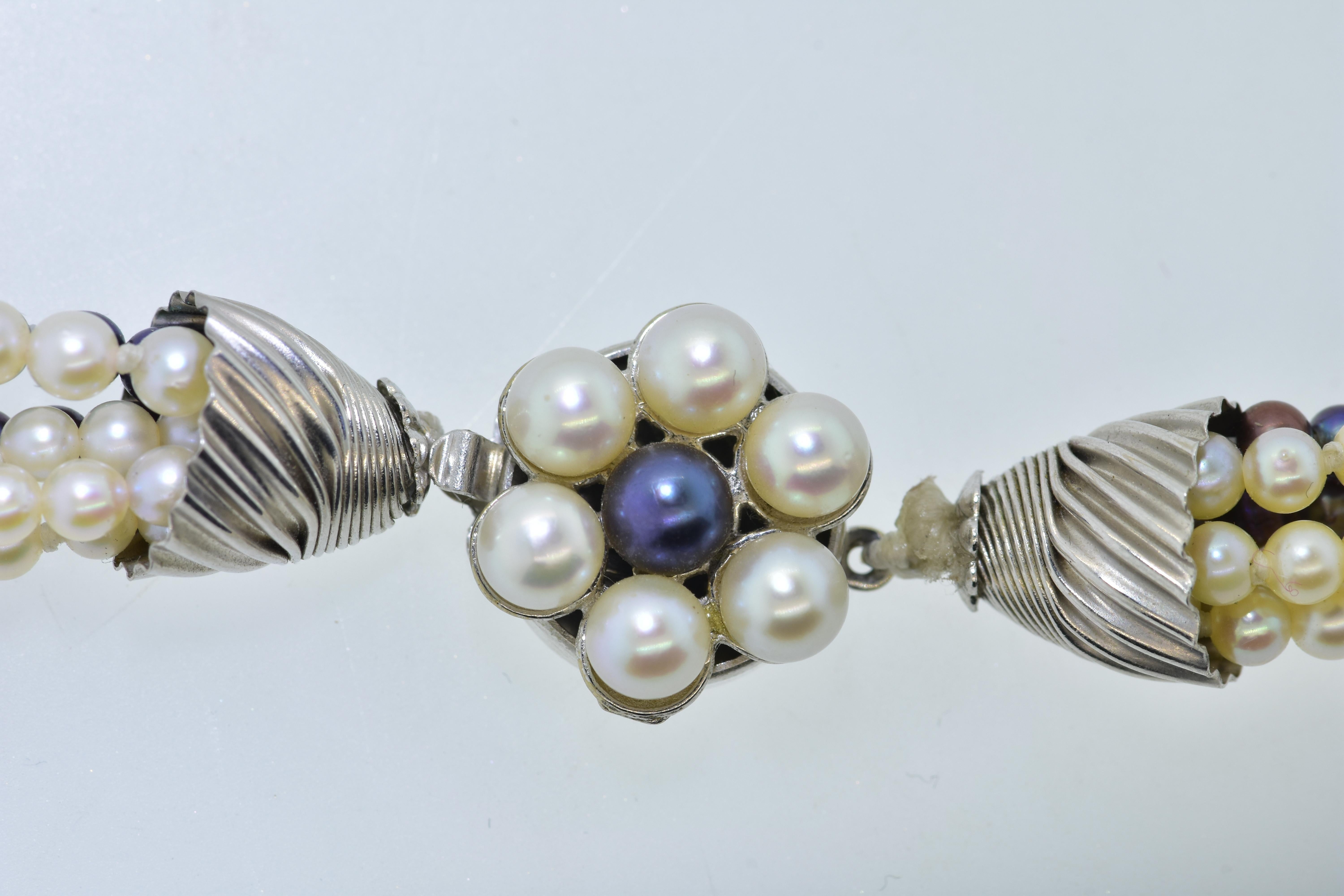 Bead   White and Black Akoya Pearls w/ a fancy white gold clasp/pendant, Contemporary For Sale