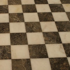 white and black alabaster chess board
