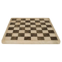 tablero de ajedrez de alabastro blanco y negro