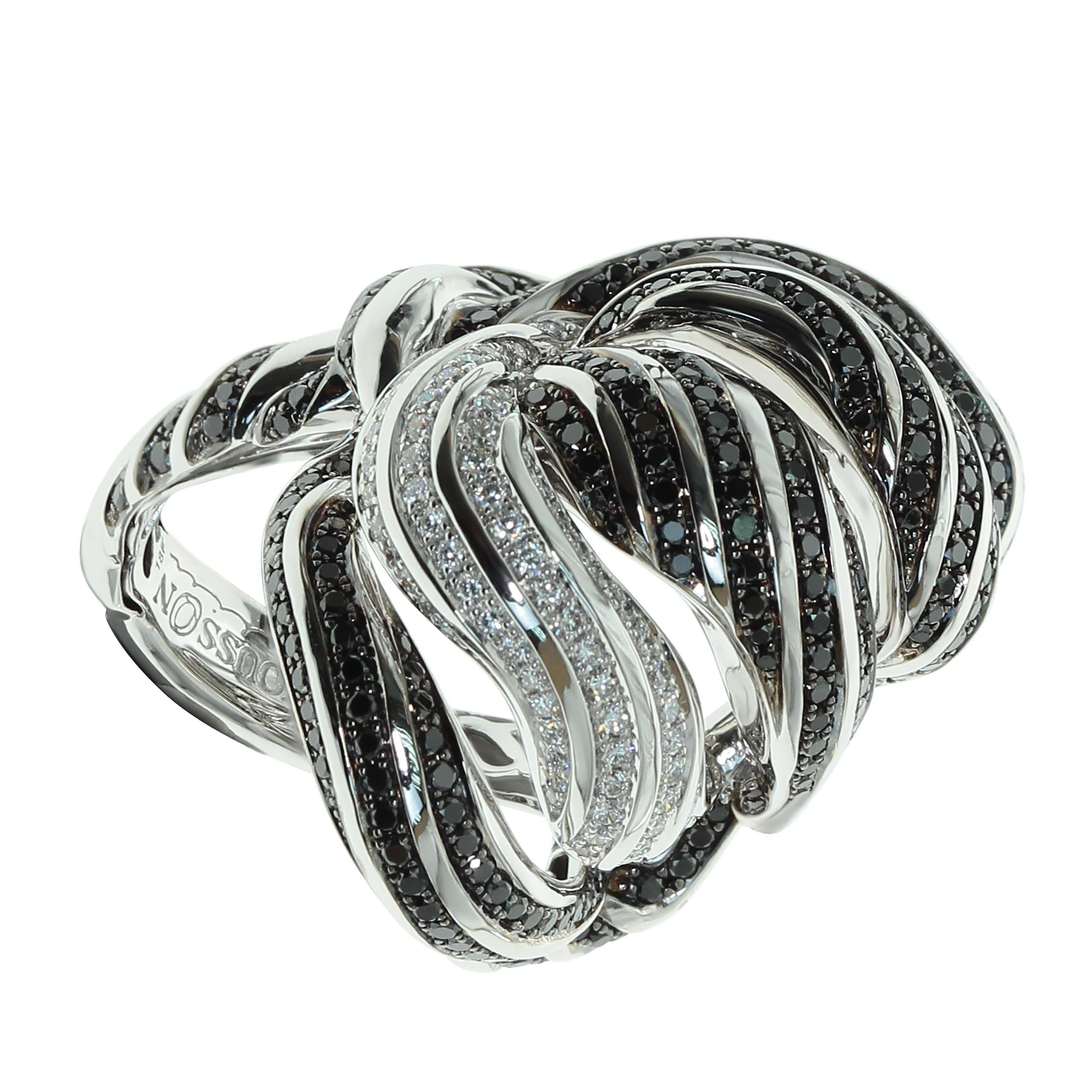 White and Black Diamonds 18 Karat White Gold Ring
Stunning contrast of 83 White and 331 Black Diamonds weighing 2.53 Carats makes this piece of art always noticeable. Shape of the Ring looks like the interweaving of different shreds of