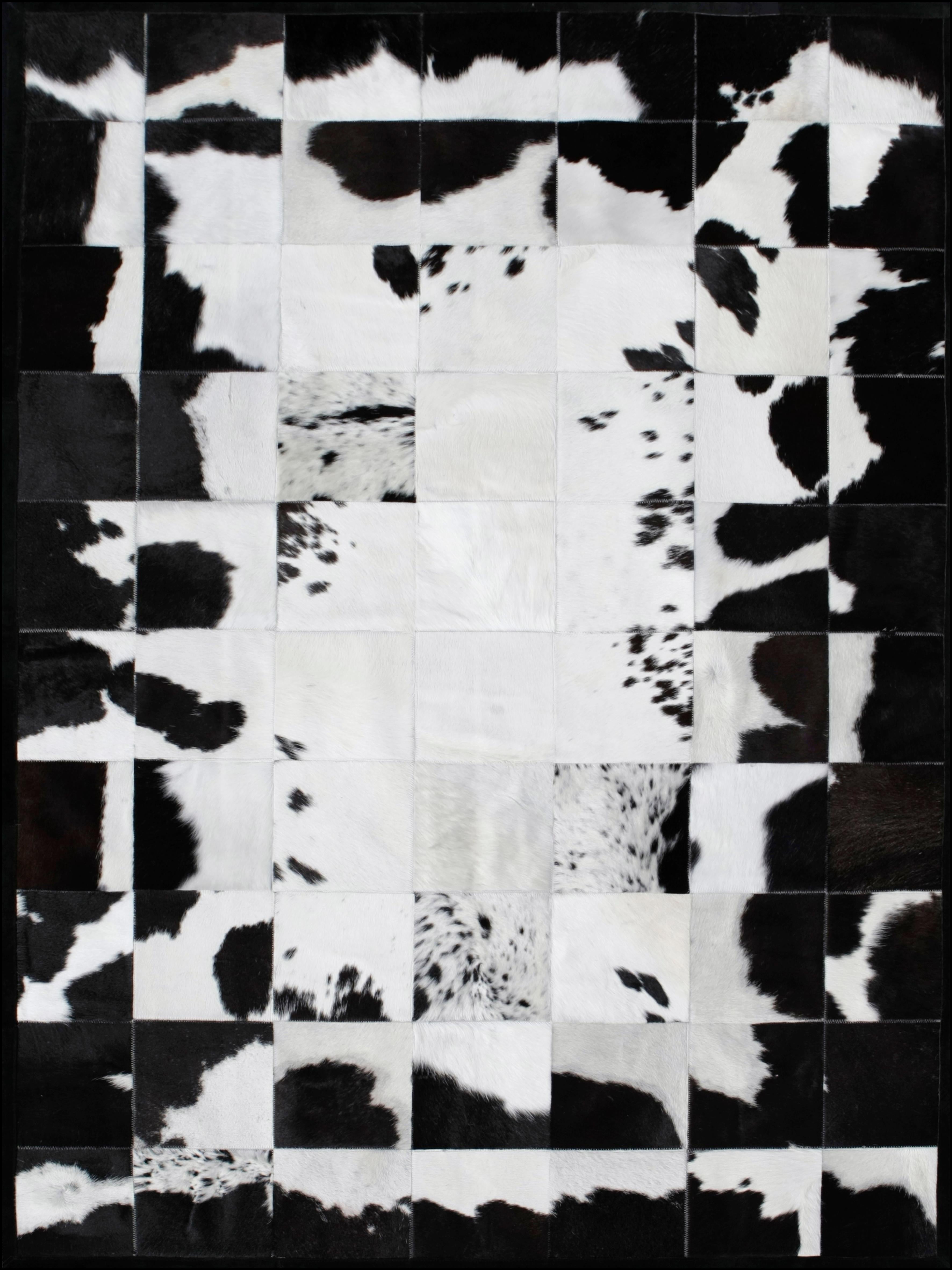 Machine-Made White and Black High End customizable Rompecabeza Cowhide Area Floor Rug Small For Sale