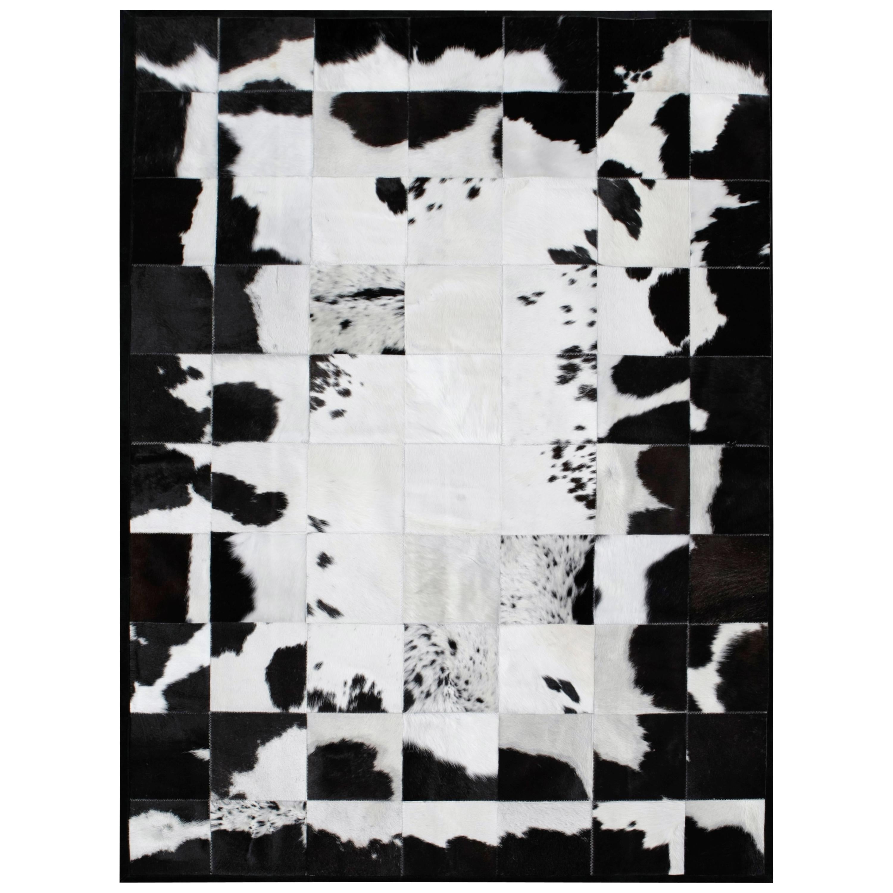 Alfombra de piel de vaca Rompecabeza blanca y negra personalizable Pequeña
