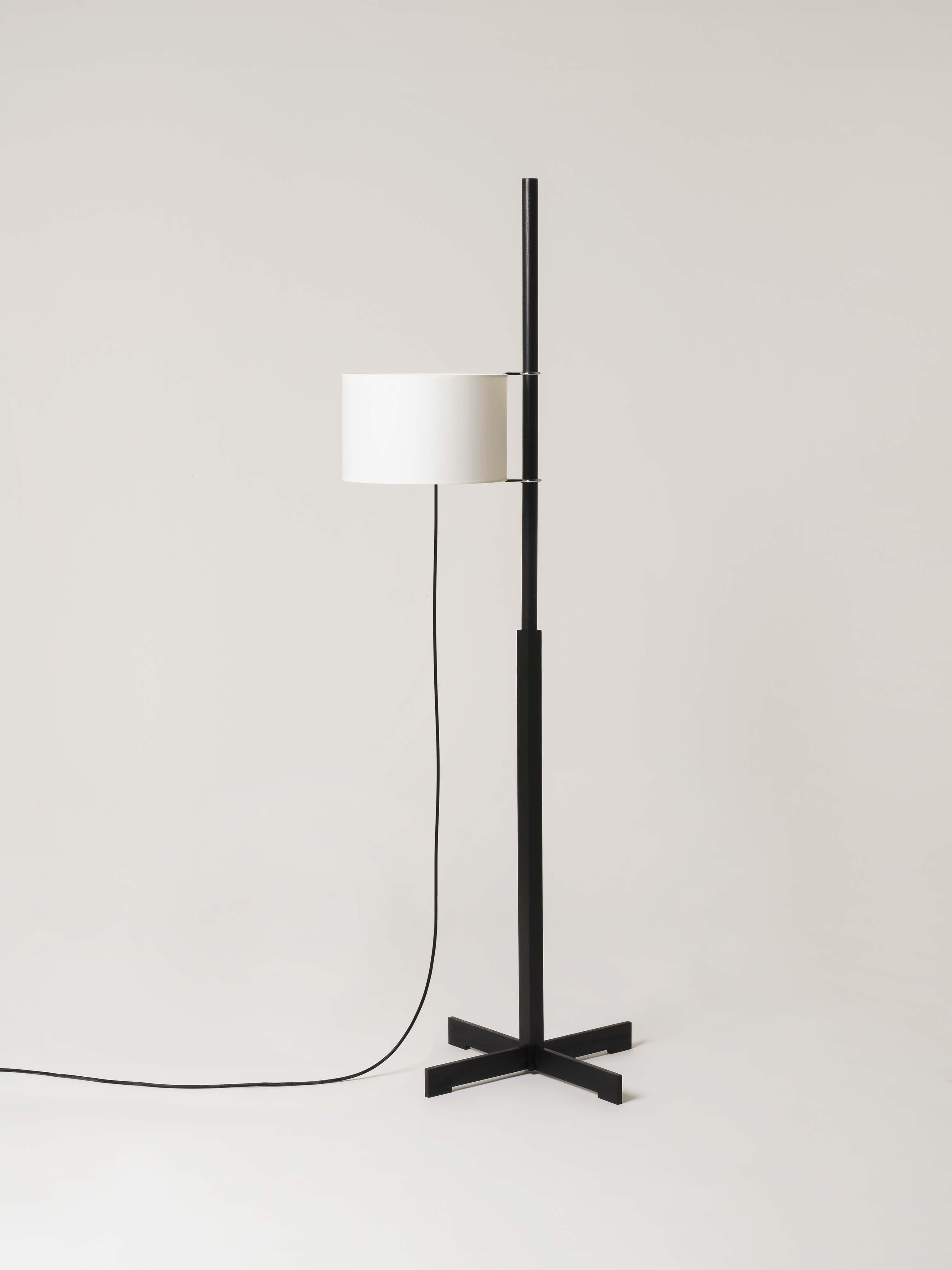 White and black oak TMM floor lamp by Miguel Milá
Dimensions: D 50 x W 60 x H 166 cm
Materials: Cherry wood, parchment lampshade.
Available in 3 lampshades: beige, white and white with diffuser.
Available in 5 woods: beech, cherry, walnut,