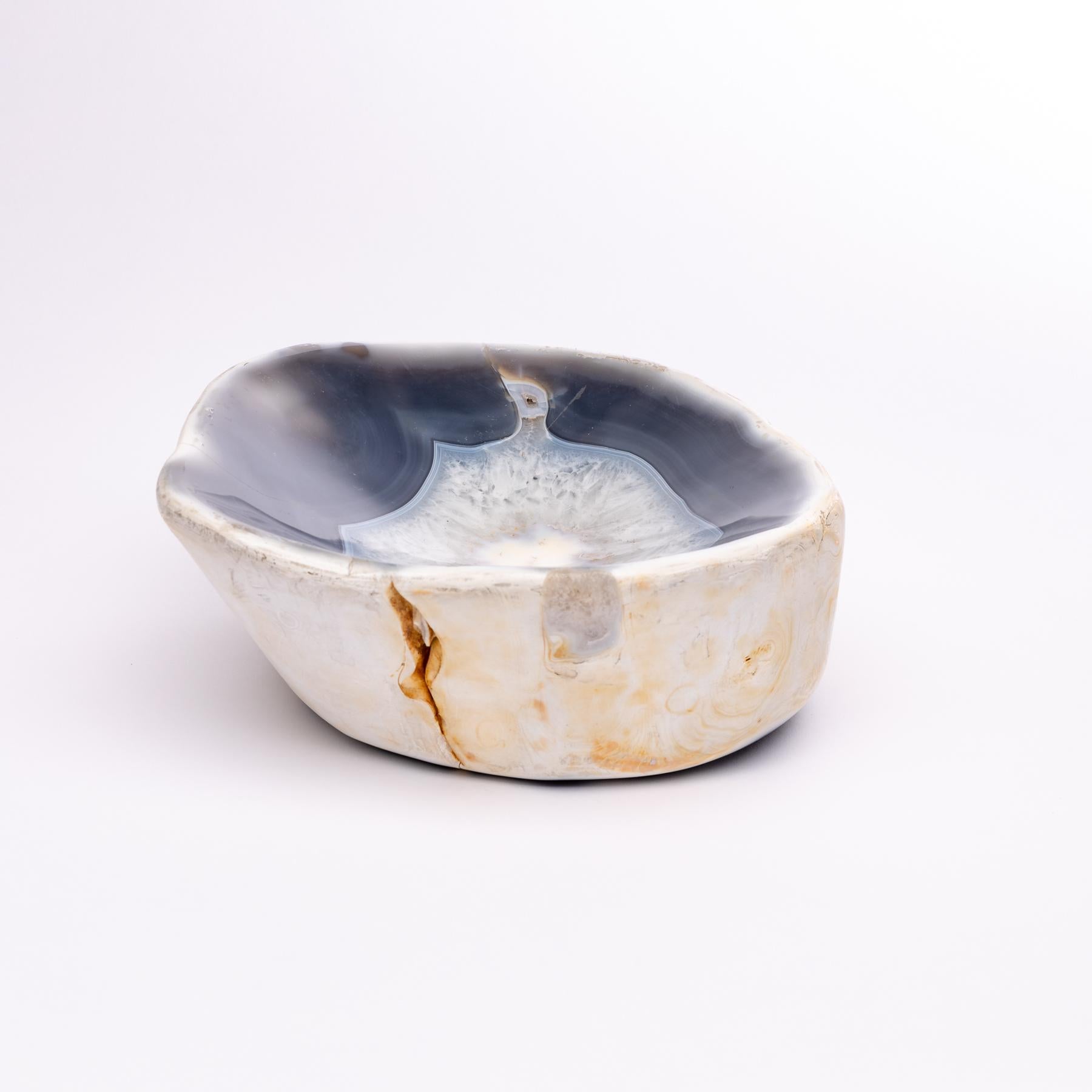 Beautiful one of a kind, blue and white shade agate geode handcrafted bowl from Madagascar.