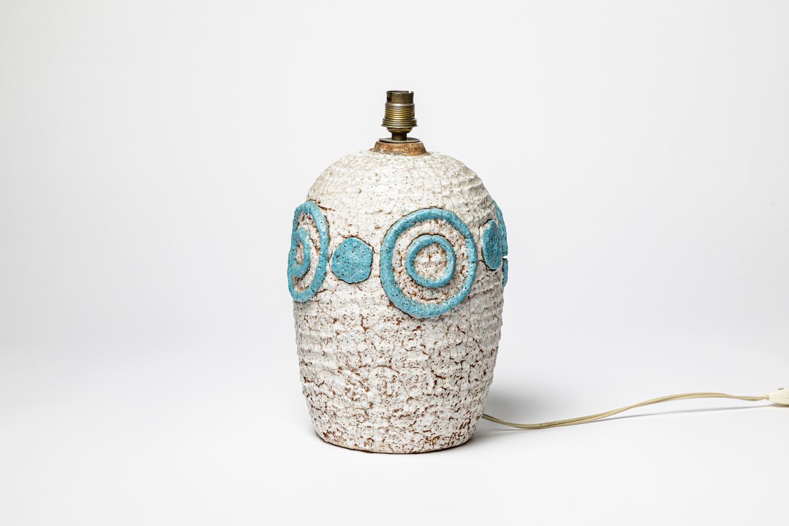 Nach dem Vorbild von Jean Besnard

original art deco keramik tischlampe

Weiße und blaue Spiralverzierung

ursprünglicher perfekter Zustand

Keramische Höhe 26 cm
Höhe mit elektrischer Anlage 30 cm
Groß 17 cm