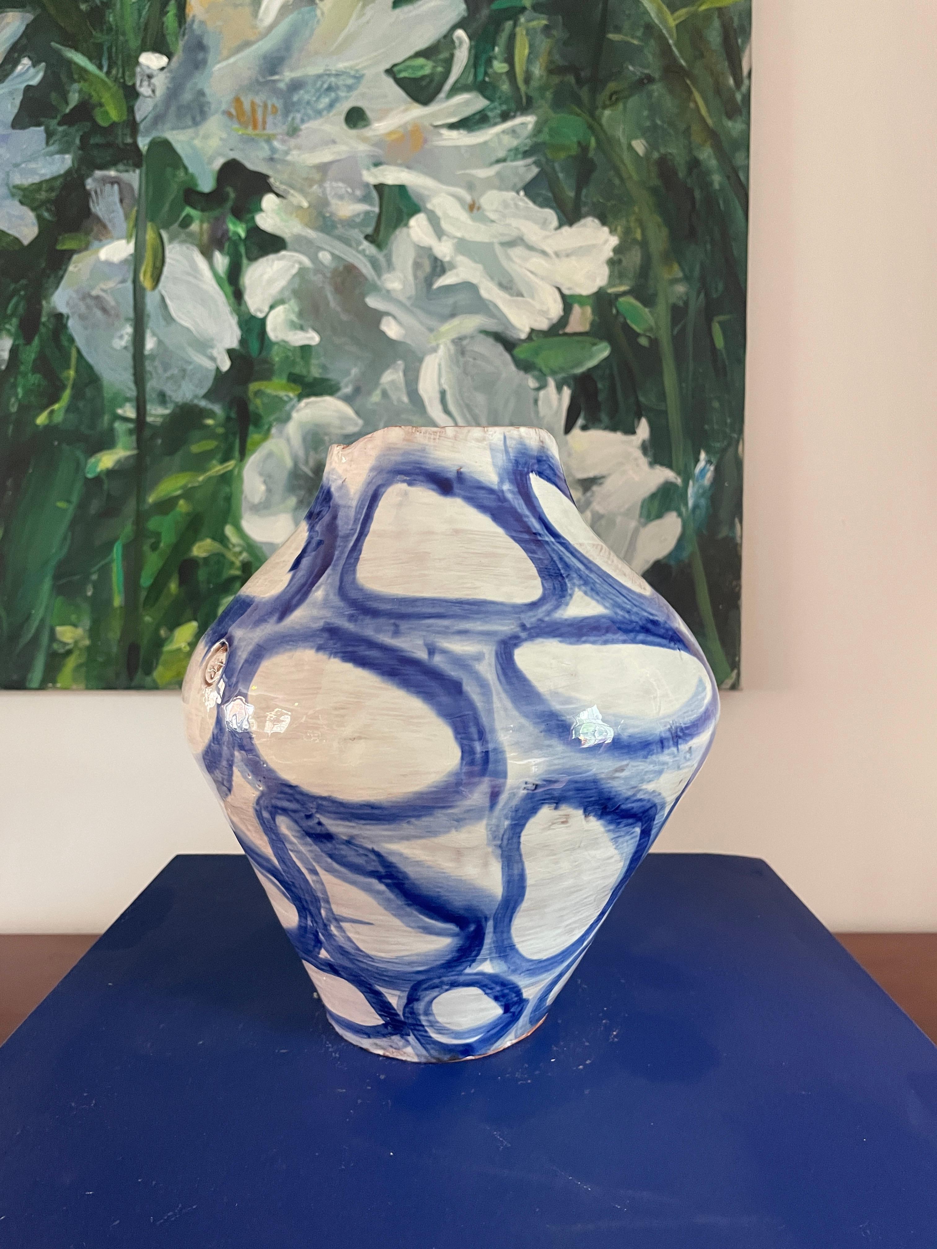 Hand coiled ceramic vase by Onofrio Acone,  glazed earthenware (majolica) unique piece hand-built and hand-painted  approx. 18cm width  23cm height

Onofrio Acone is a ceramic artists  based in the Amalfi Coast in the South of Italy. Onofrio creates