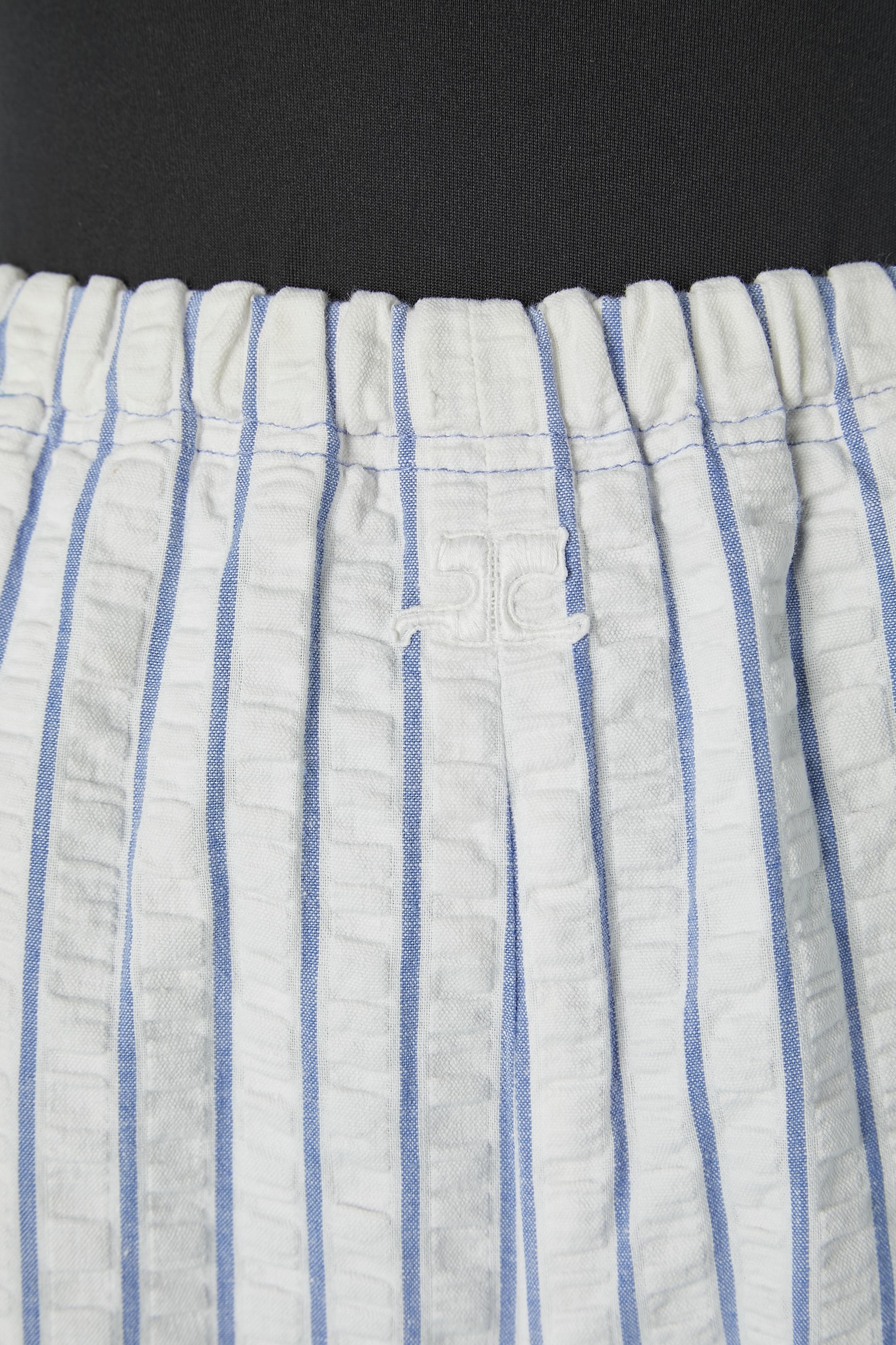 White and blue striped cotton bermuda. Pocket on both side. Elastic waist band. Branded in the top middle front. 
SIZE 