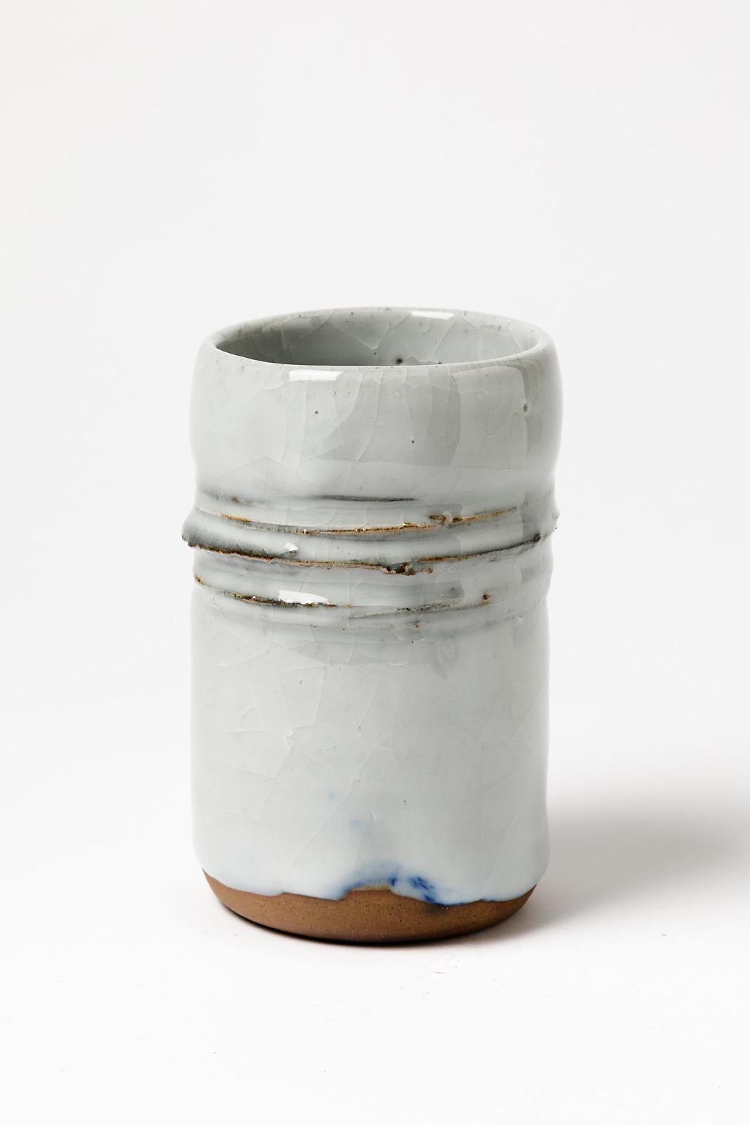 Unique ceramic vase

XXth century design 

Signed under the base

White and blue ceramic glazes colors

Original perfect condition

Measures: H 16 cm L 10 cm.