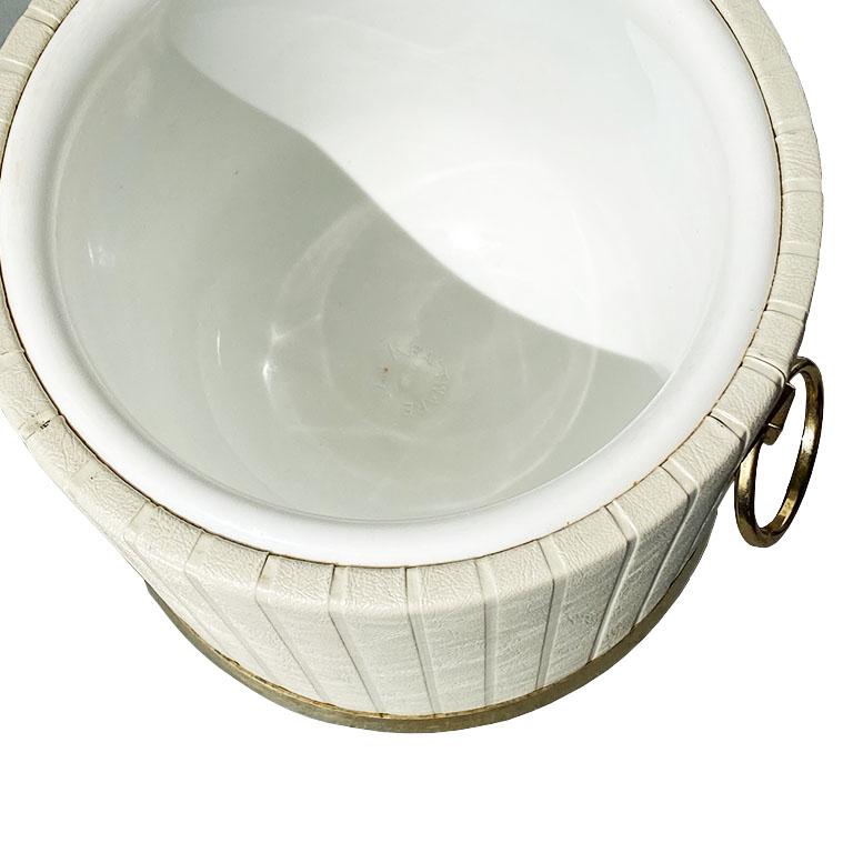 Mid-Century Modern White and Brass Channel Upholstered Eagle Ice Bucket with Eagle Handle For Sale