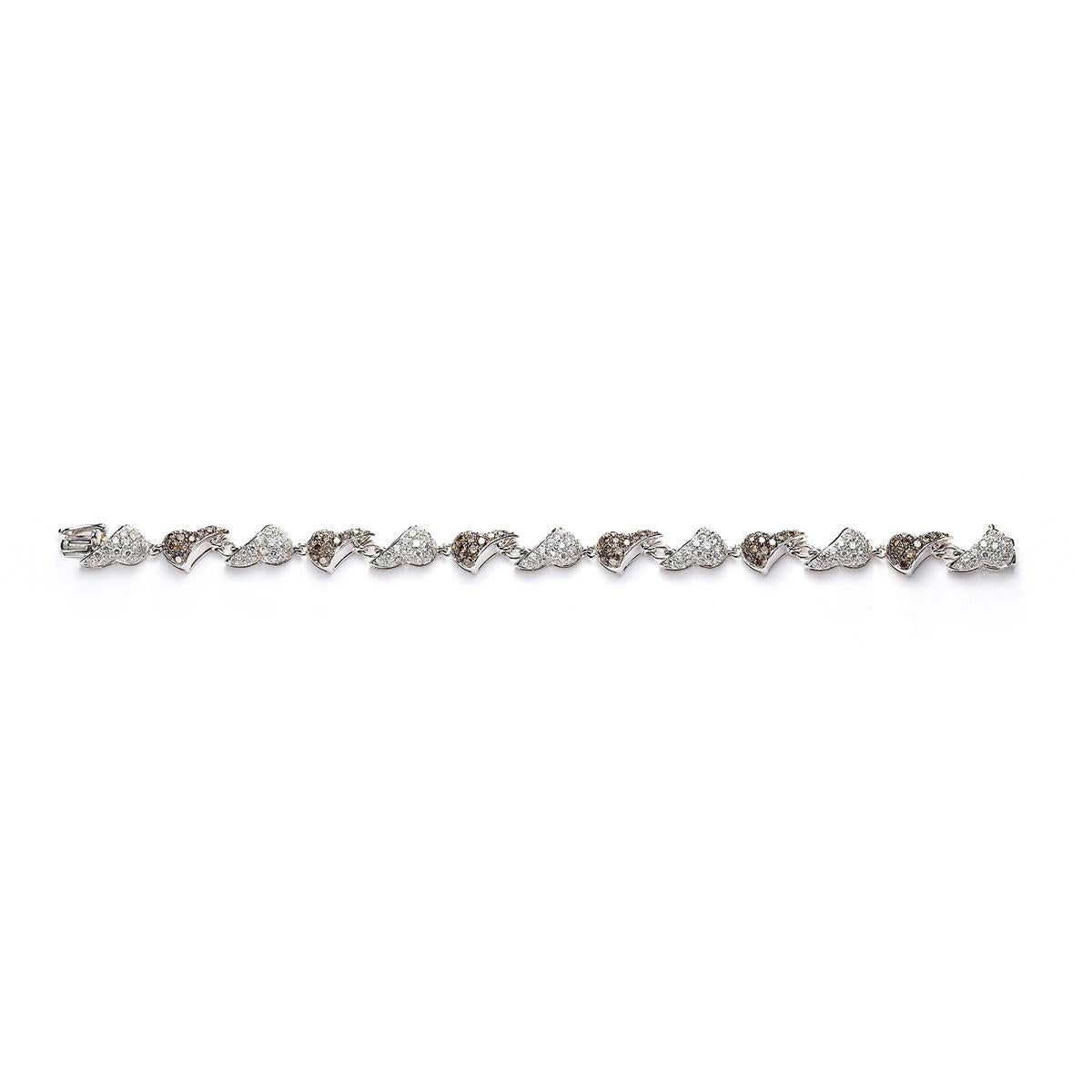 Bracelet in 18kt white gold set with 126 diamonds 3.52 cts and 108 brown diamonds 3.65 cts