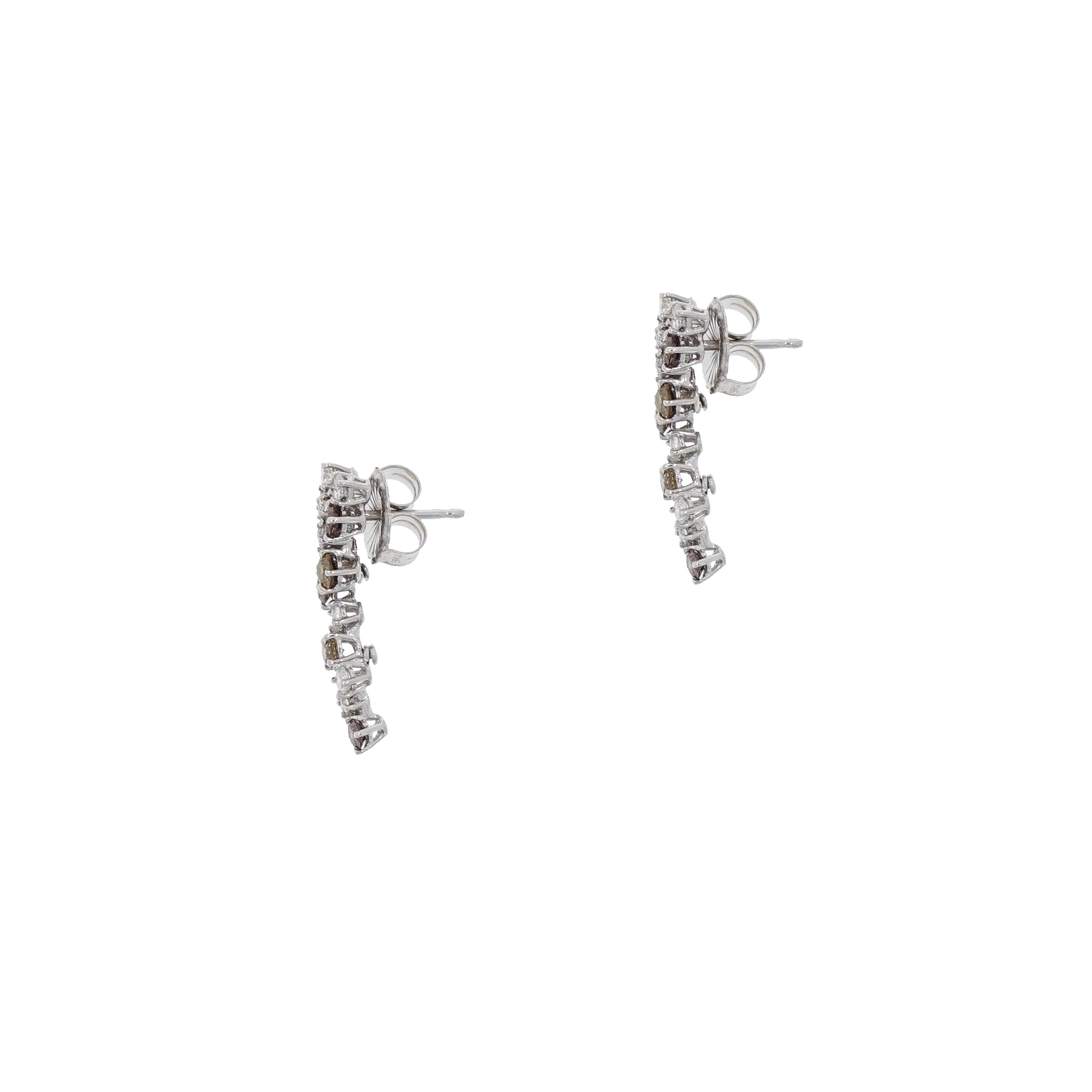 We love creating Diamond earrings, especially for everyday as well as the most precious life moments to remember and cherish.
Handcrafted with the finest quality Diamonds in 14k white gold and showcase 1.00 carats total weight of round white and