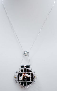 White and Fancy Diamonds, Onyx, White Stones, 14 Kt  Gold Pendant Necklace.