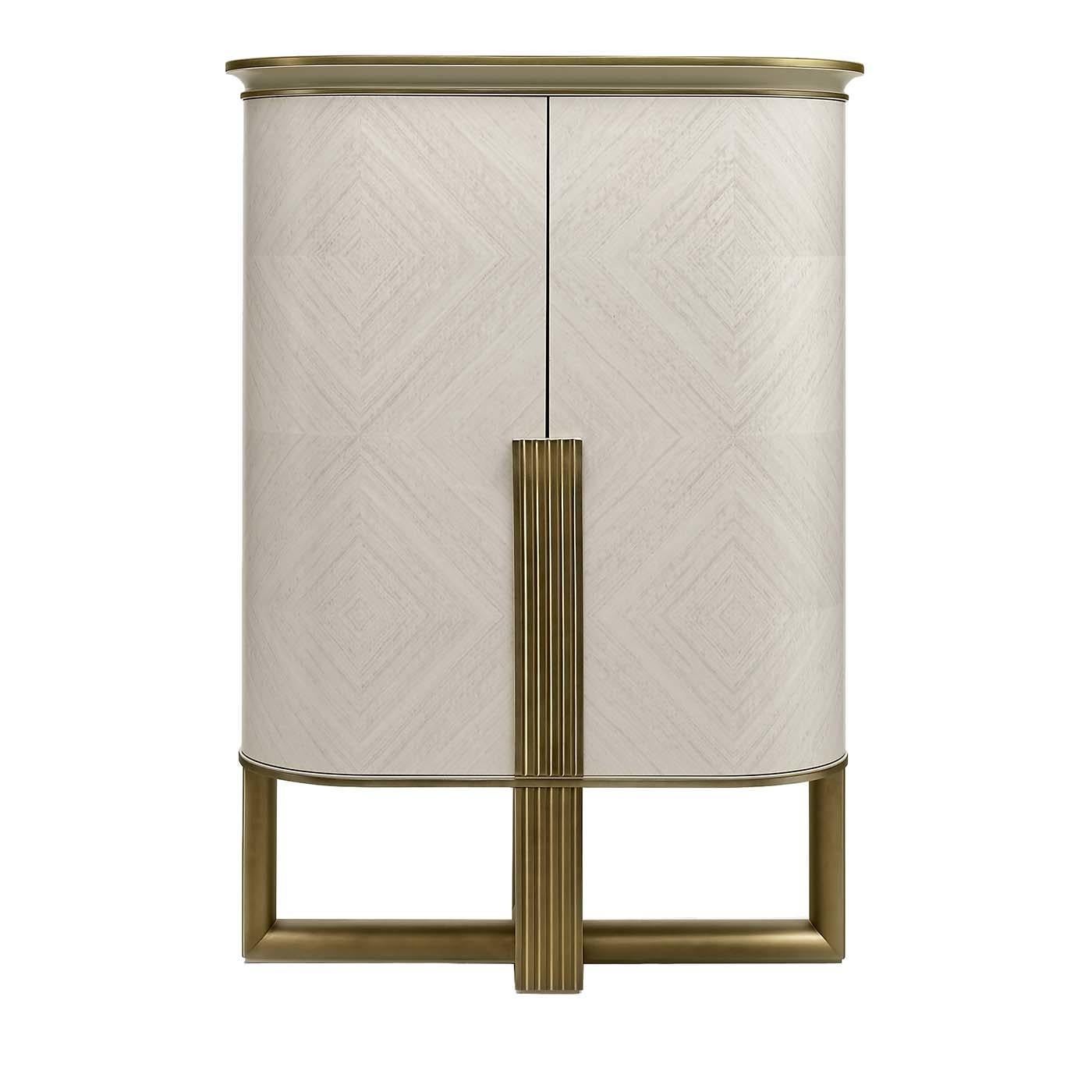 Part of a collection of exclusive and refined furniture pieces, this cabinet will be the focal point of any festive gathering. Is exquisitely fashioned of wood. Supported by a frame of plywood and white eucalyptus-veneered MDF, the sturdy silhouette