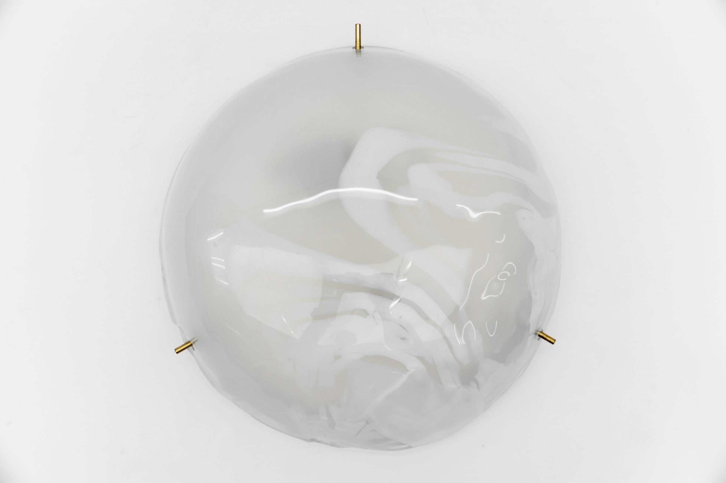 White Murano Glass Flush Mount Light by Hillebrand, Germany 1960s,

Dimensions
Height: 4.33 in. (11 cm)
Diameter: 13.77 in. (35 cm)

The fixture need 2 x E27 standard bulb with 60W max.

Light bulbs are not included.
It is possible to install this