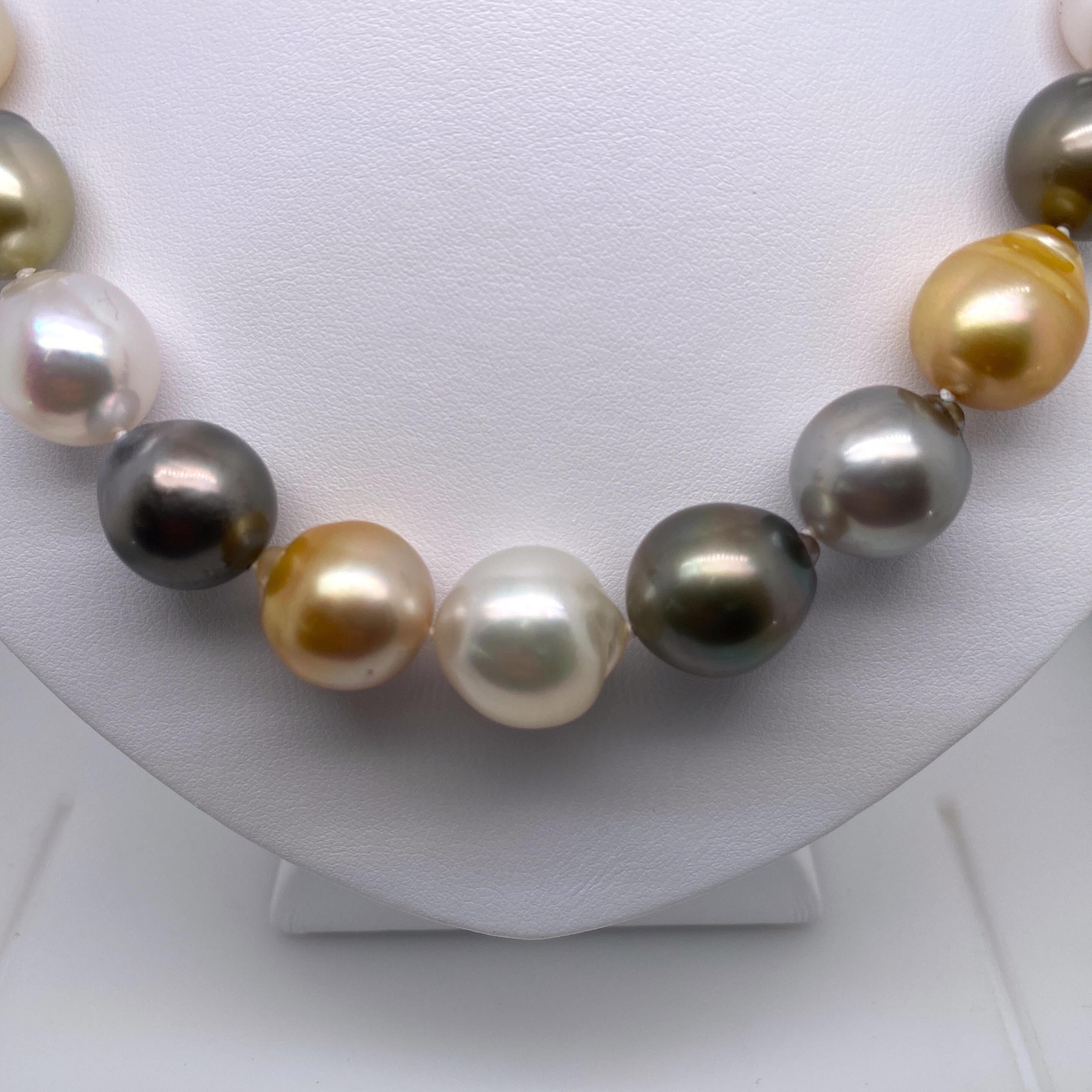 A lovely strand of 27 multi-color baroque pearls featuring White South Sea, Golden South Sea and Tahitian pearls measuring 12-16 mm with a yellow gold diamond clasp.
Quality: AAA
Pearl Luster: AAA Excellent
Nacre : Very Thick

Strand can be made to