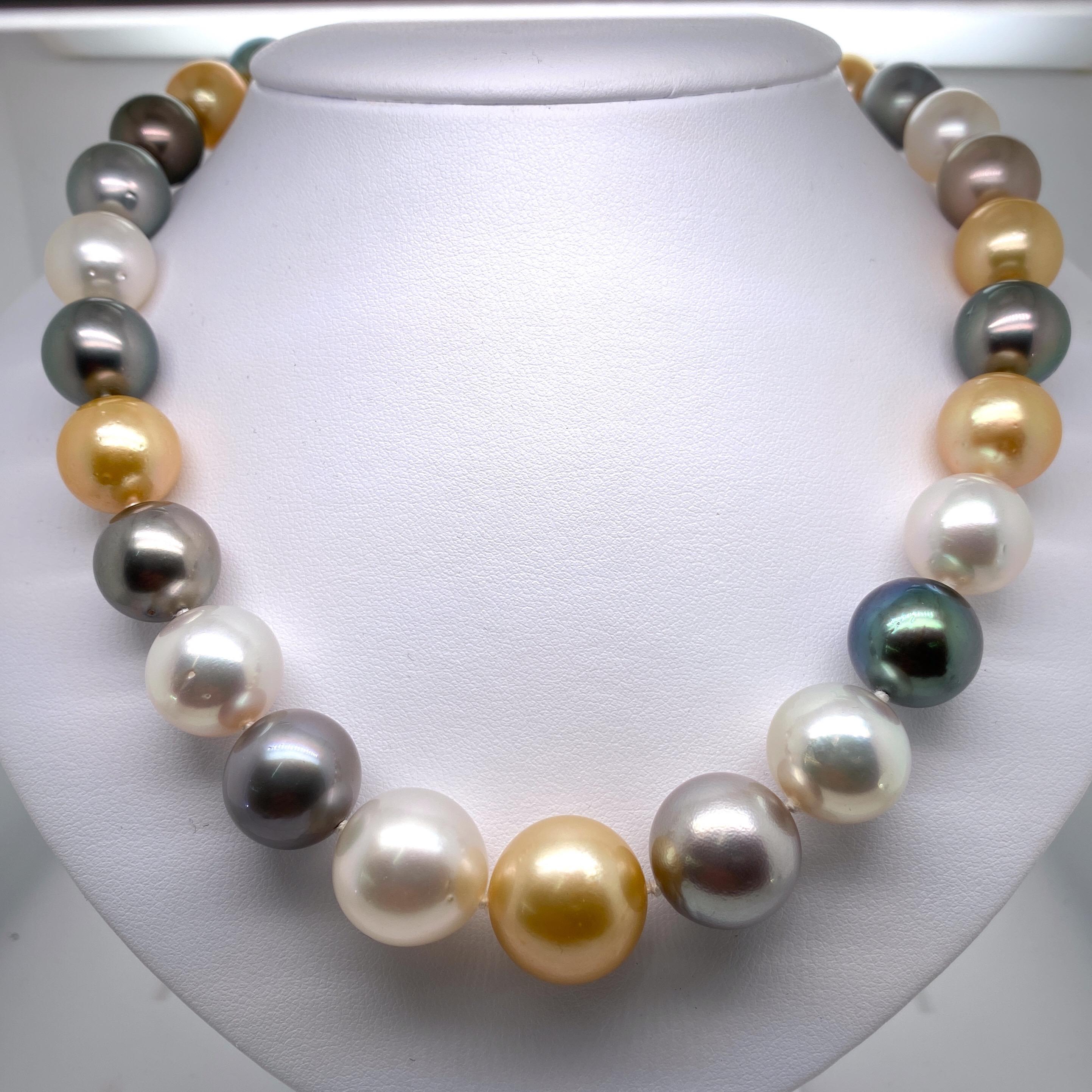 A beautiful strand of 31 multi-color pearls featuring White South Sea, Golden South Sea and Tahitian pearls measuring 13-16.5 mm with a high polish gold and diamond clasp 14K. 

Pearl quality: AAA
Pearl Luster: AAA Excellent
Nacre : Very