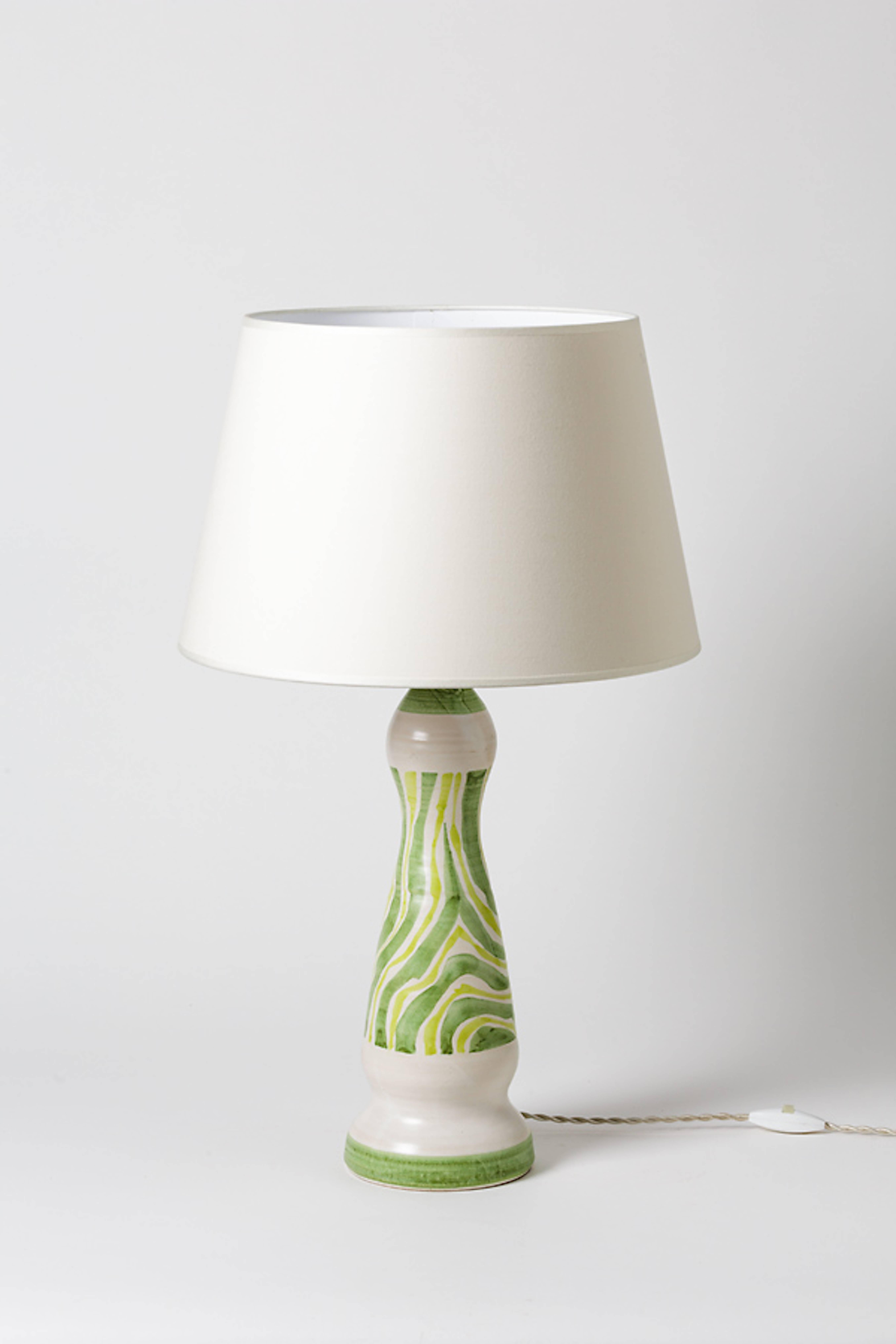 Robert Deblander

Original and elegant ceramic table lamp with white and green abstract decoration.

Signed under the base.

circa 1960.
Unique piece.

Sold without lampshade

Height without lampshade 18' inch.
Height without electrical