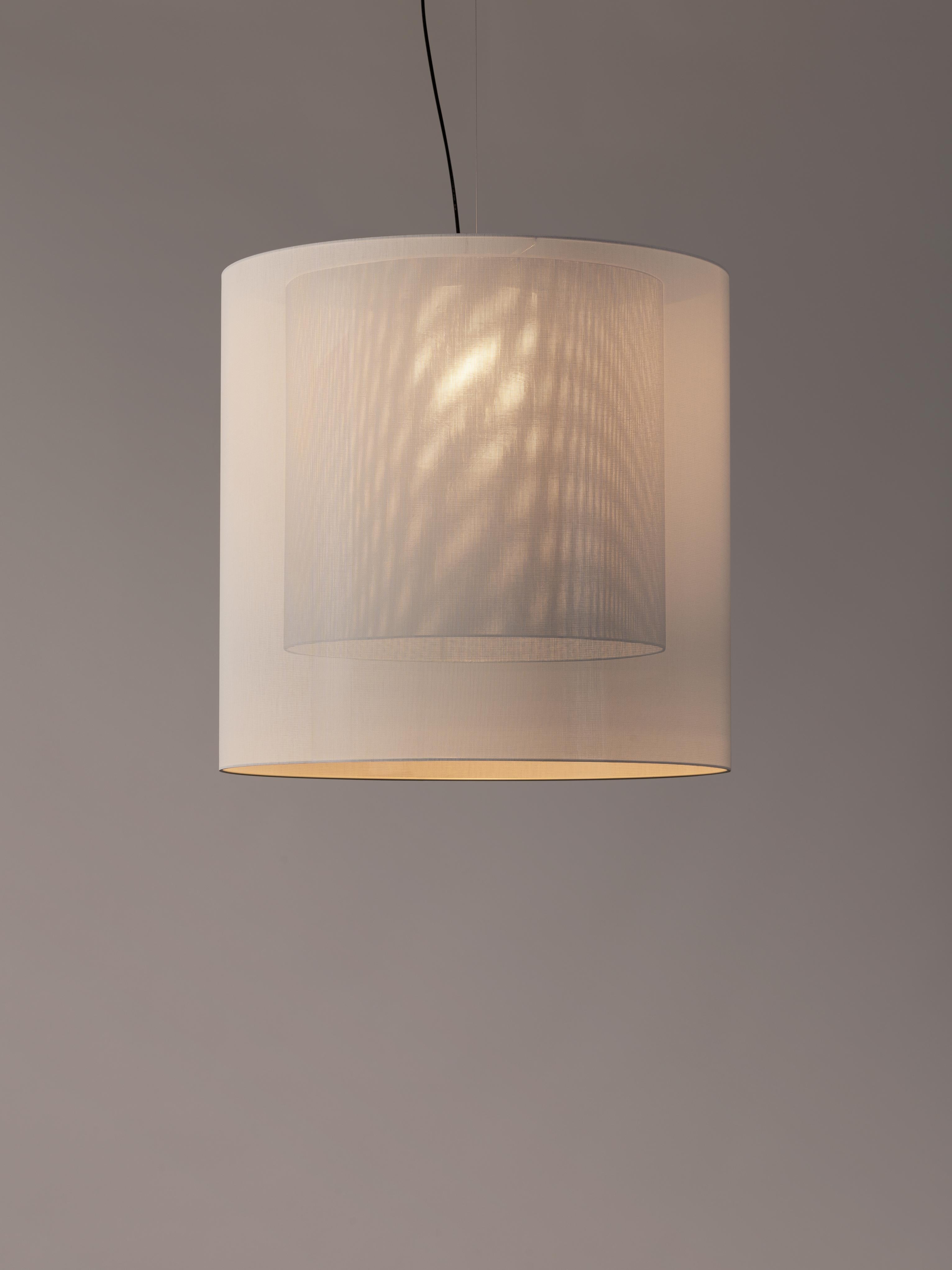 White and grey moaré XL pendant lamp by Antoni Arola
Dimensions: D 83 x H 81 cm
Materials: Metal, polyester.
Available in other colors and sizes.

Moaré’s multiple combinations of formats and colours make it highly versatile. The series takes