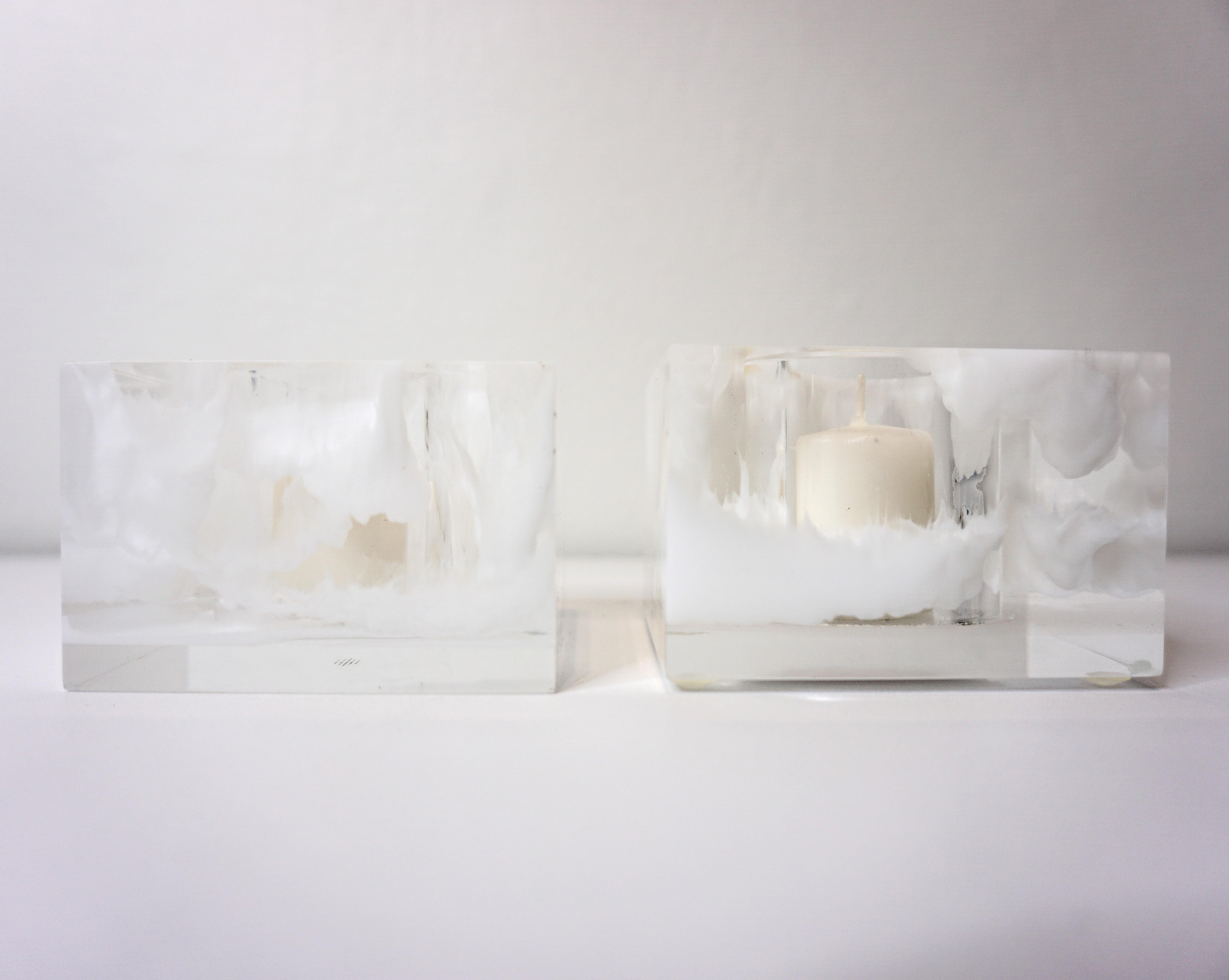 Sawyer Collection lucite and white swirled votives add a modern element to any decor.