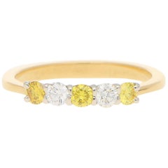 White and Natural Yellow Diamond Half Eternity Ring Set in 18 Karat Yellow Gold
