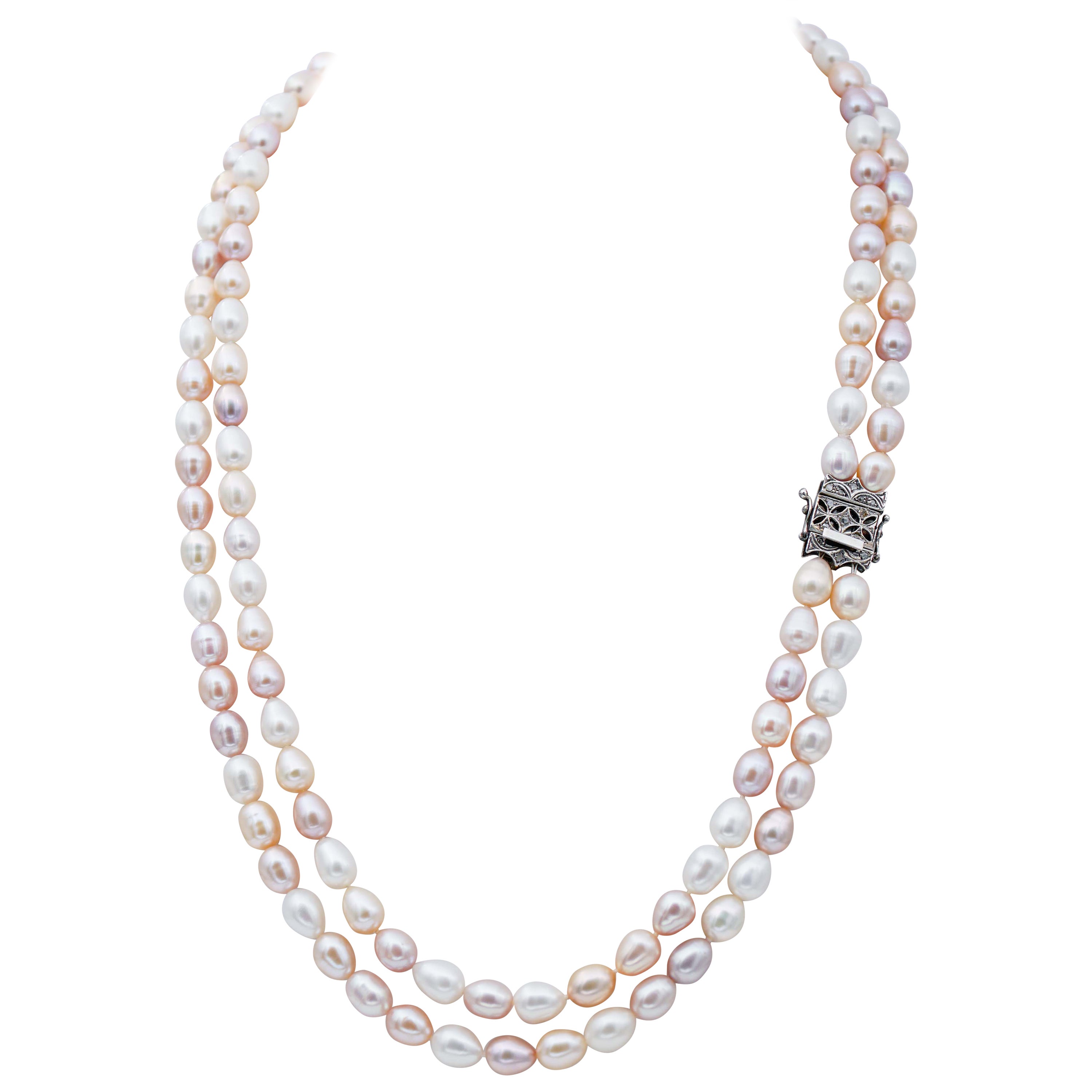 Collier multibrins en perles blanches et roses, diamants, or rose et argent