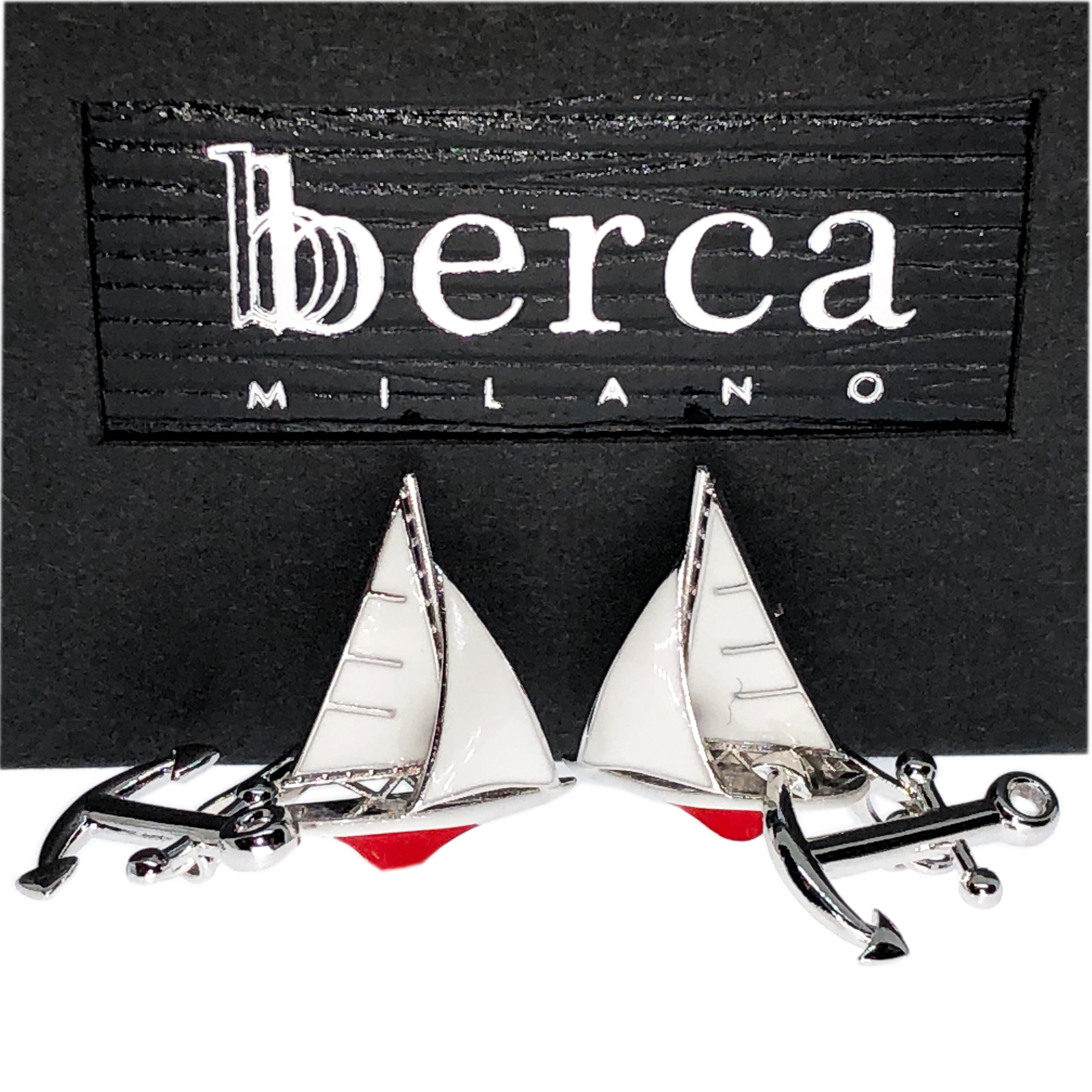 Unique, chic yet timeless, White and Red Hand Enameled Sailing Boat, little anchor back, sterling silver cufflinks.

In our smart fitted tobacco leather case.