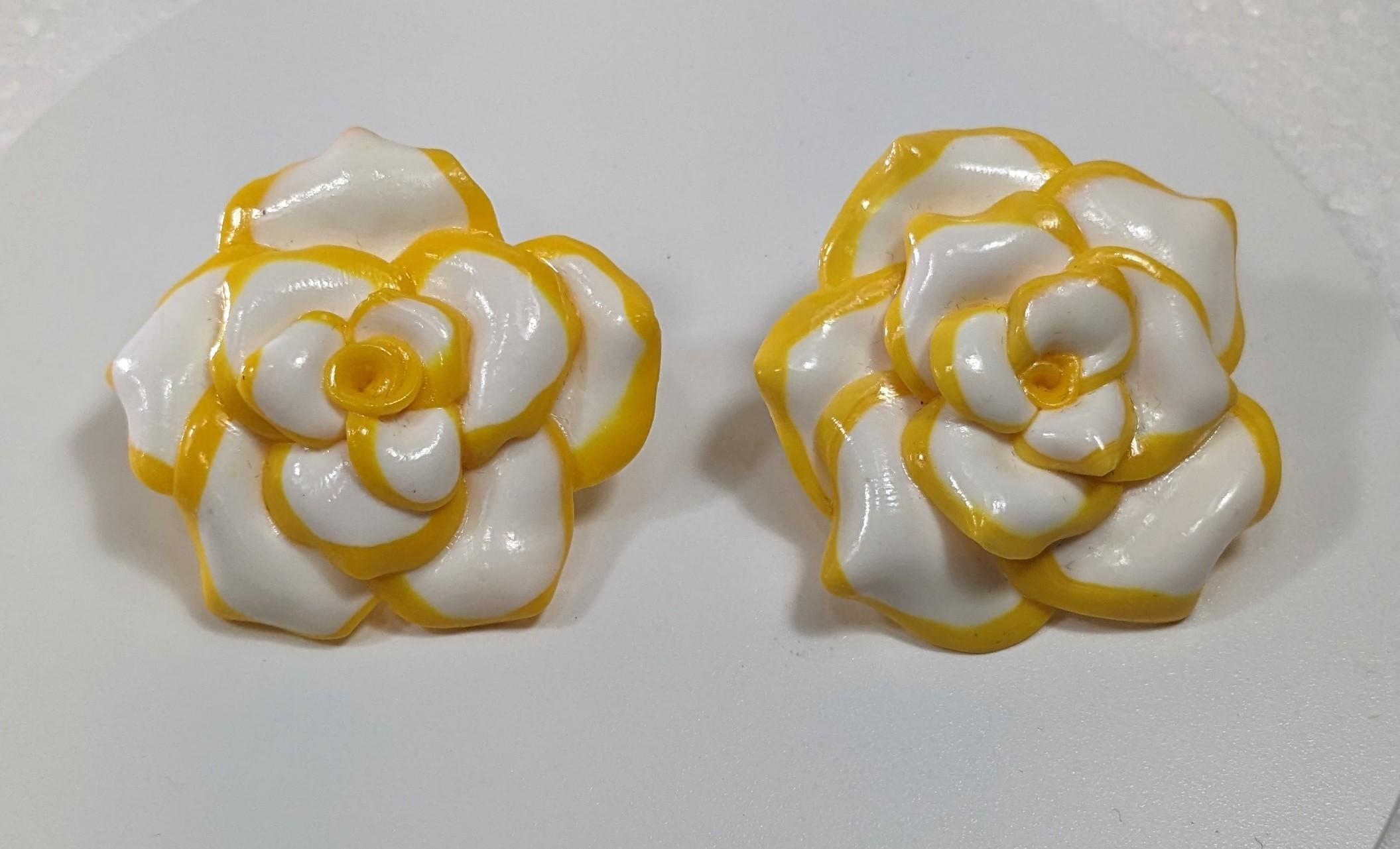 White and Yellow Camelia Polymer  Clay Earrings with golplated silver closure

Diameter: 5 cm
Weight: 16 grams
Color  White and Yellow
Handmade




Pradera Fashion Division  is specialized in European Fashion designers, clothing, handbags,
