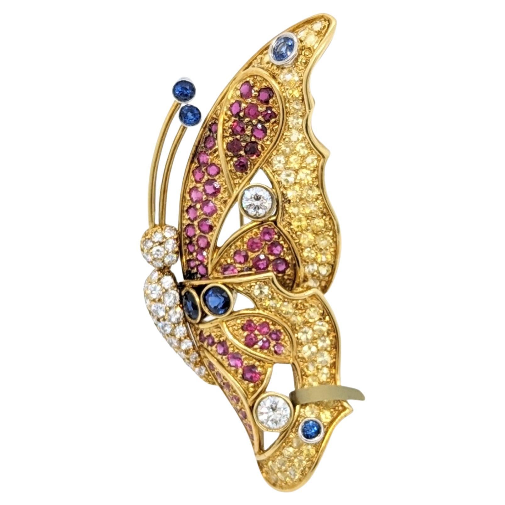 White and Yellow Diamond, Ruby, and Sapphire Butterfly Brooch in 18K Yellow Gold