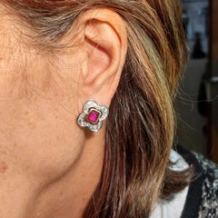 White and yellow gold earrings with 1.90 ct rubies and 1.56 ct diamonds