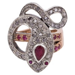 White and Yellow Gold, Ruby and Rose Cut Diamond Snake Ring