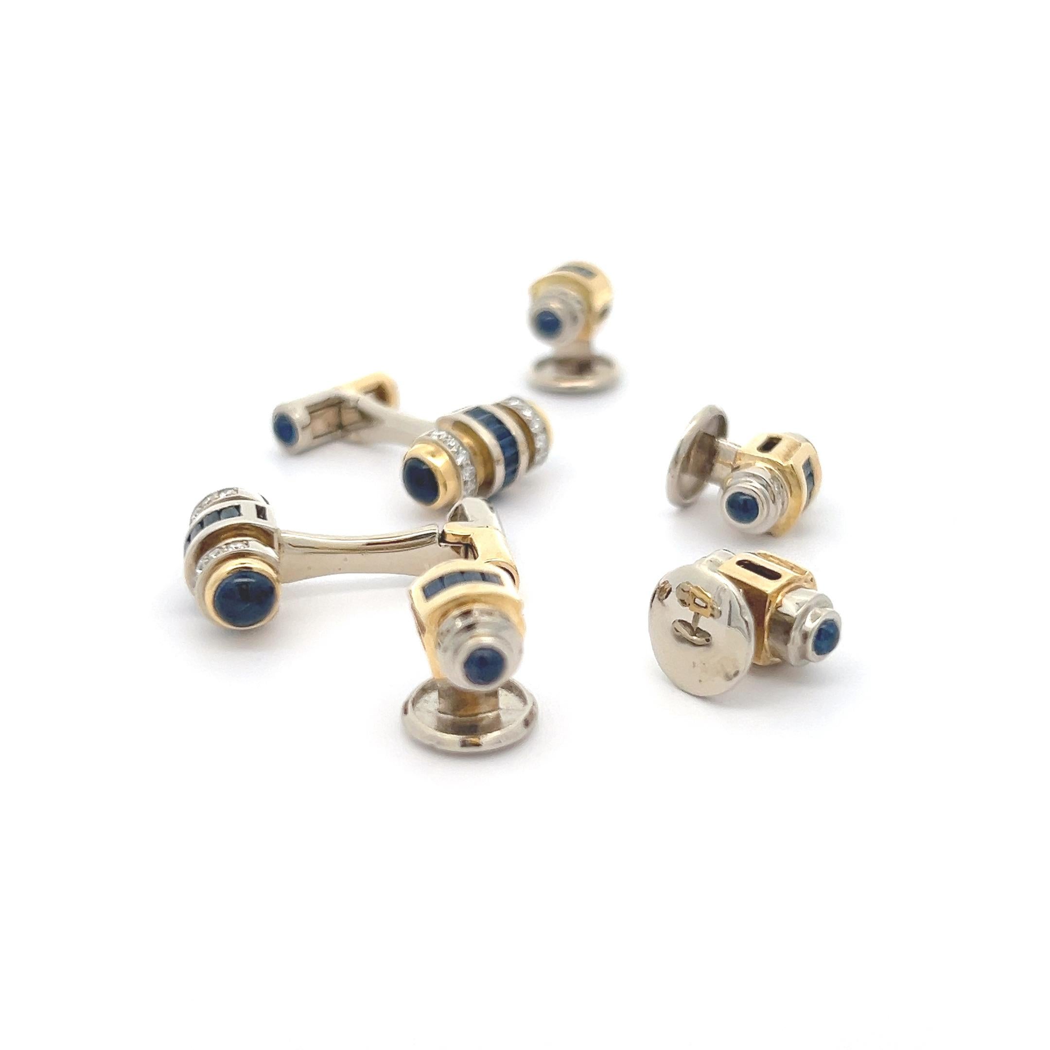Stunning 18k yellow and white gold cufflinks and studs, meticulously crafted to perfection. At the heart of each piece lies a row of mesmerizing baguette blue sapphires, exuding a rich and captivating hue that commands attention with its timeless