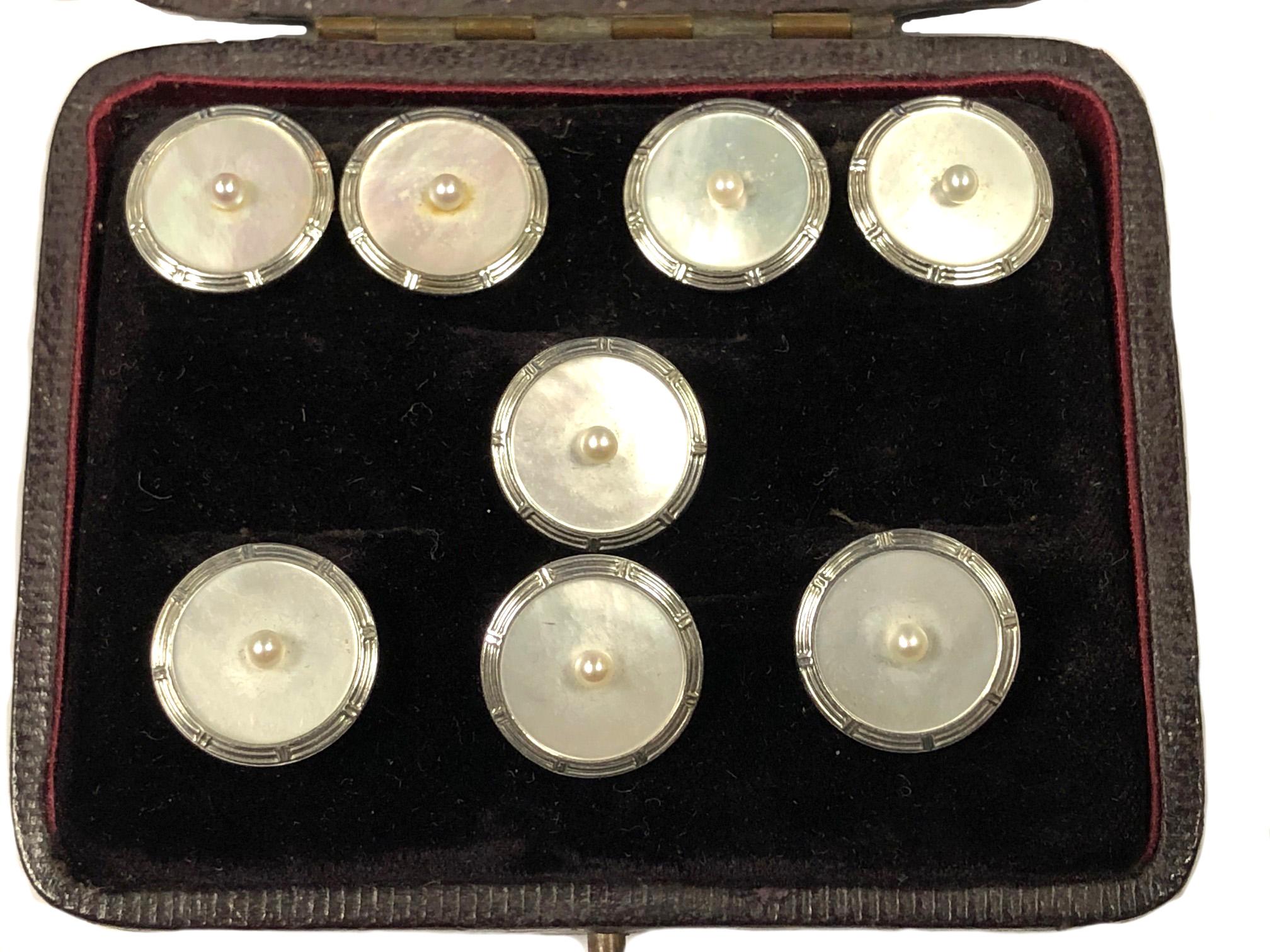 Circa 1930 14K White and Yellow Gold Tuxedo Dress Set comprising of a pair of Cufflinks and 4 shirt studs, set with a 2 MM Pearl atop White Mother of Pearl, measuring 1/2 inch in diameter. This set is in excellent, seldom worn condition and comes in