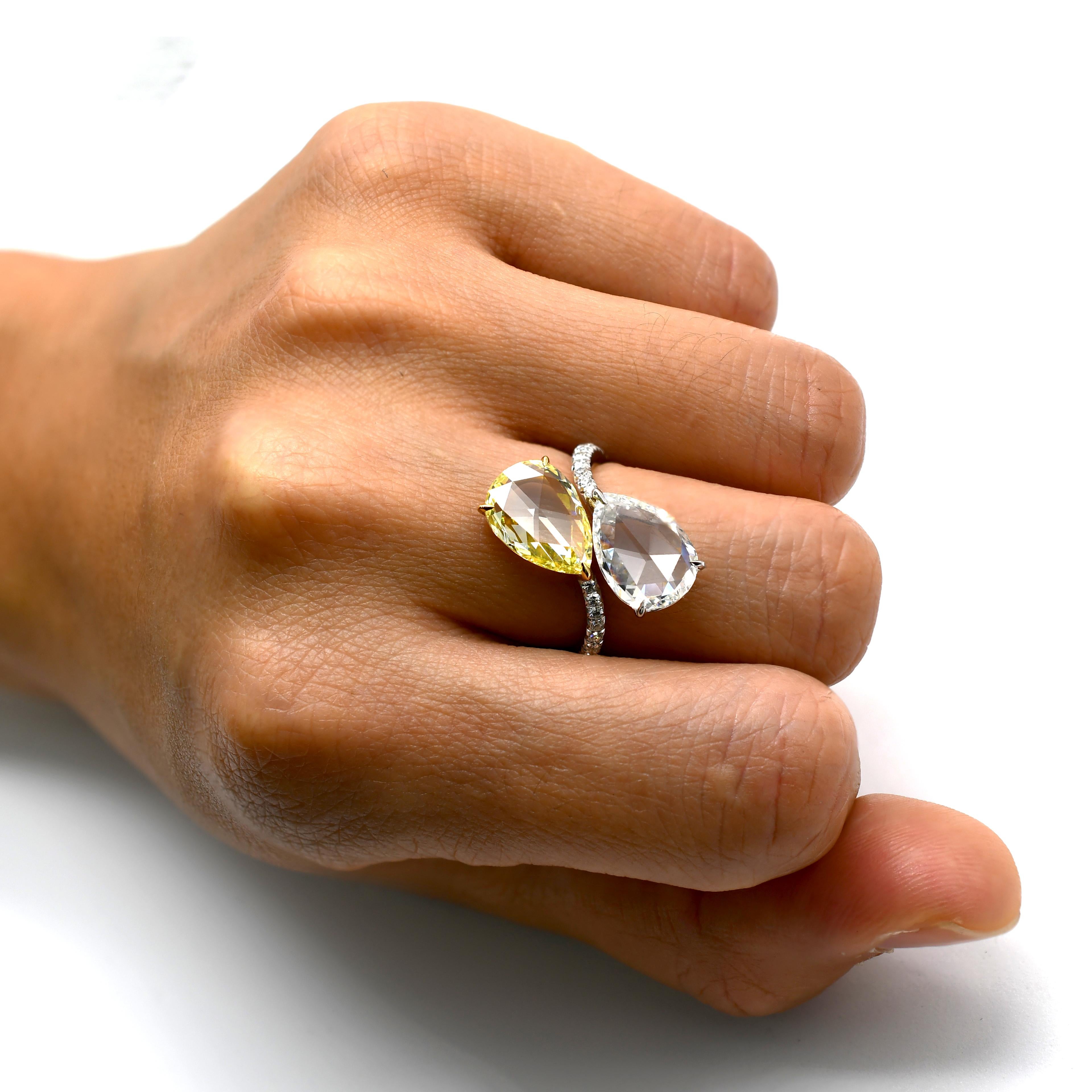 The Contrast Matching of Yellow and White Color Rosecut Diamond in Similar Weight and Diameter is Rare and Noticeable.
The Natural Yellow Rosecut Pear is 1.84 Carat - VVS Clarity and White Rosecut Pear is 1.93 Carat -VS Clarity, Surrounded by White
