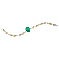 White and yellow swarovski zirconia stones, green pear stone Bracelet NWOT