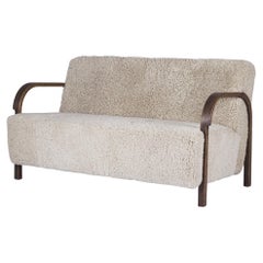 White ARCH 2 Seater Sofa in Oak and Moonlight Sheepskin by Mazo Design