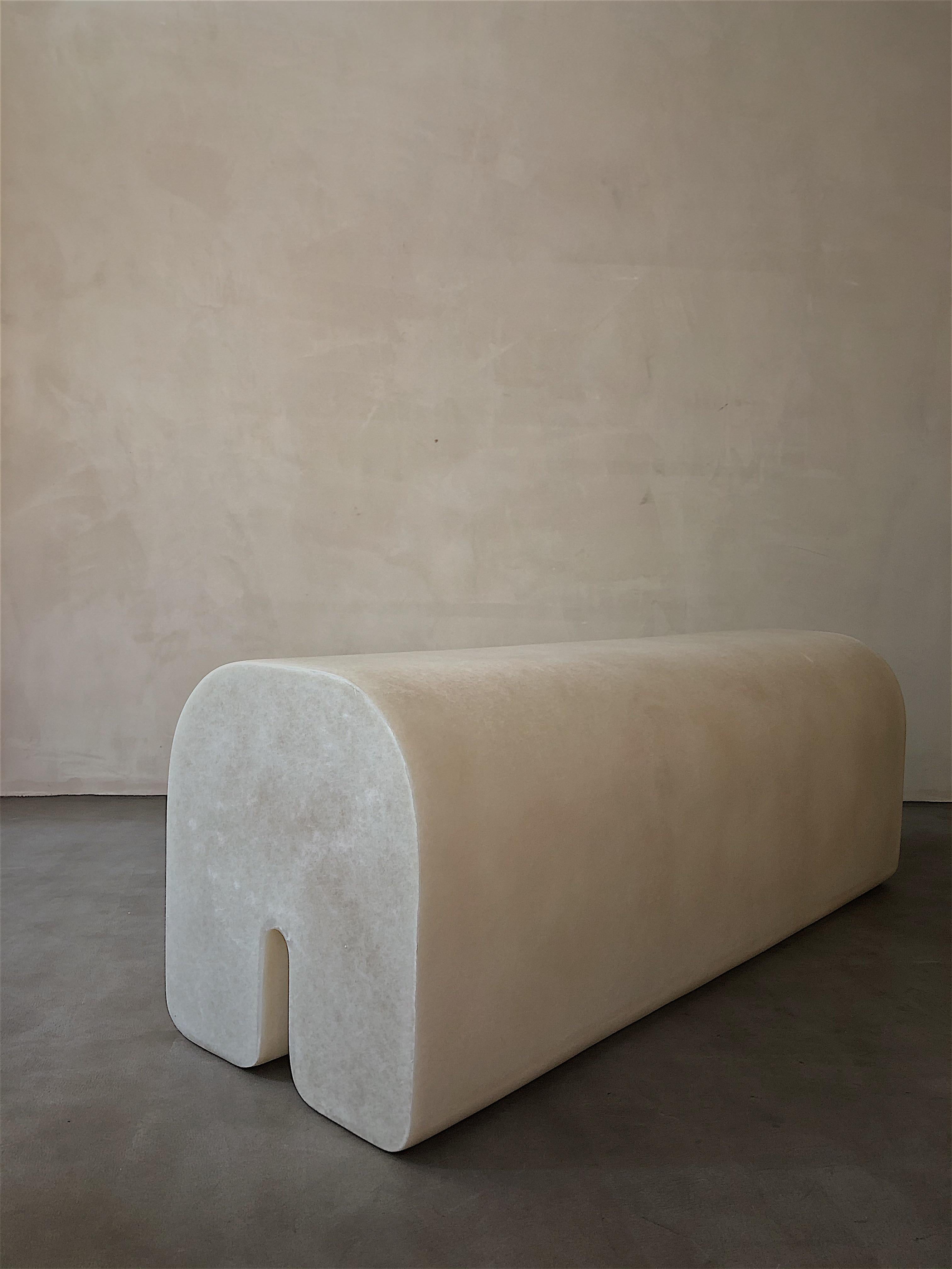 White Arch bench by Karstudio.
Materials: FRP.
Dimensions: 120 x 40 x 43 cm.

*This piece is suitable for outdoor use.

Both display ways make it the focus of the space. It could be laid as a bench, and stand up as a stand for art