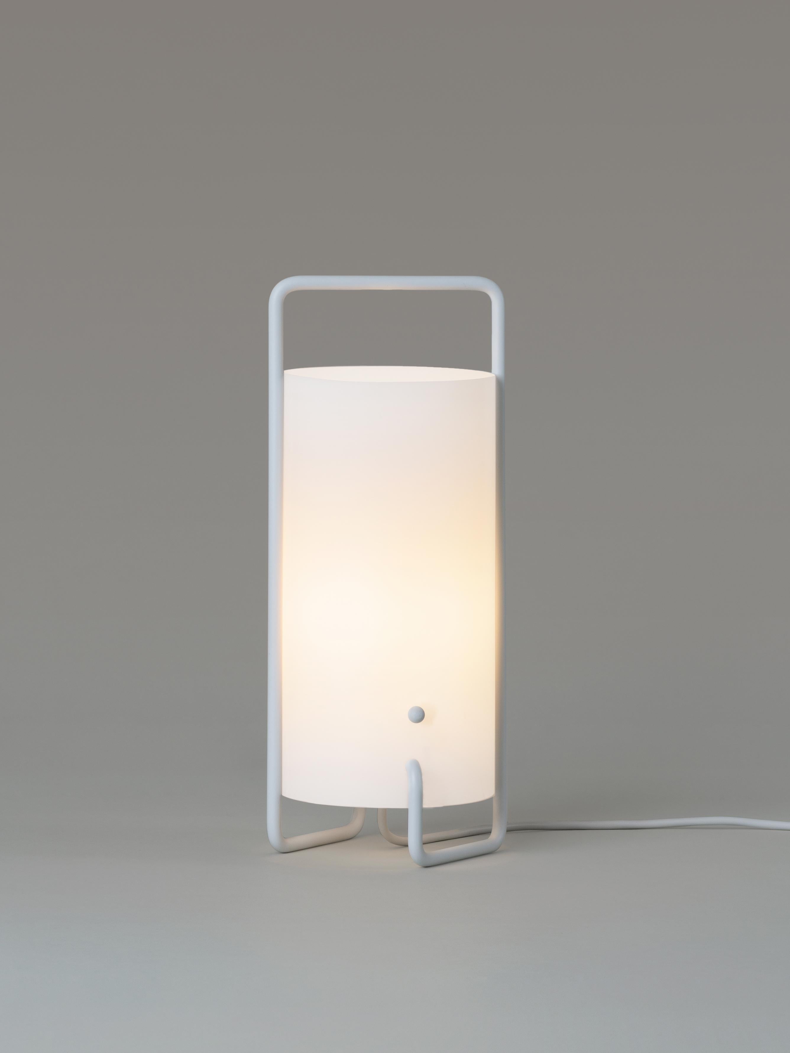 White Asa table lamp by Miguel Mila.
Dimensions: D 15 x H 41 cm.
Materials: Metal, methacrylate shade.

Asa is built of an ingenious, single, continuous tube structure which also defines the upper, handle-shaped structure for carrying. It has
