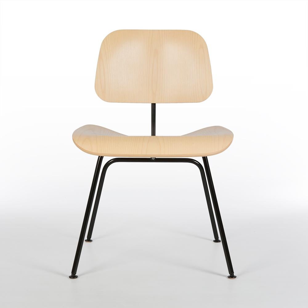 The white ash of the plywood sections look amazing on the black finished frame of this original Herman Miller DCM molded plywood dining chair designed by Eames. This particular example is in a great used condition. It is only a few years old so has
